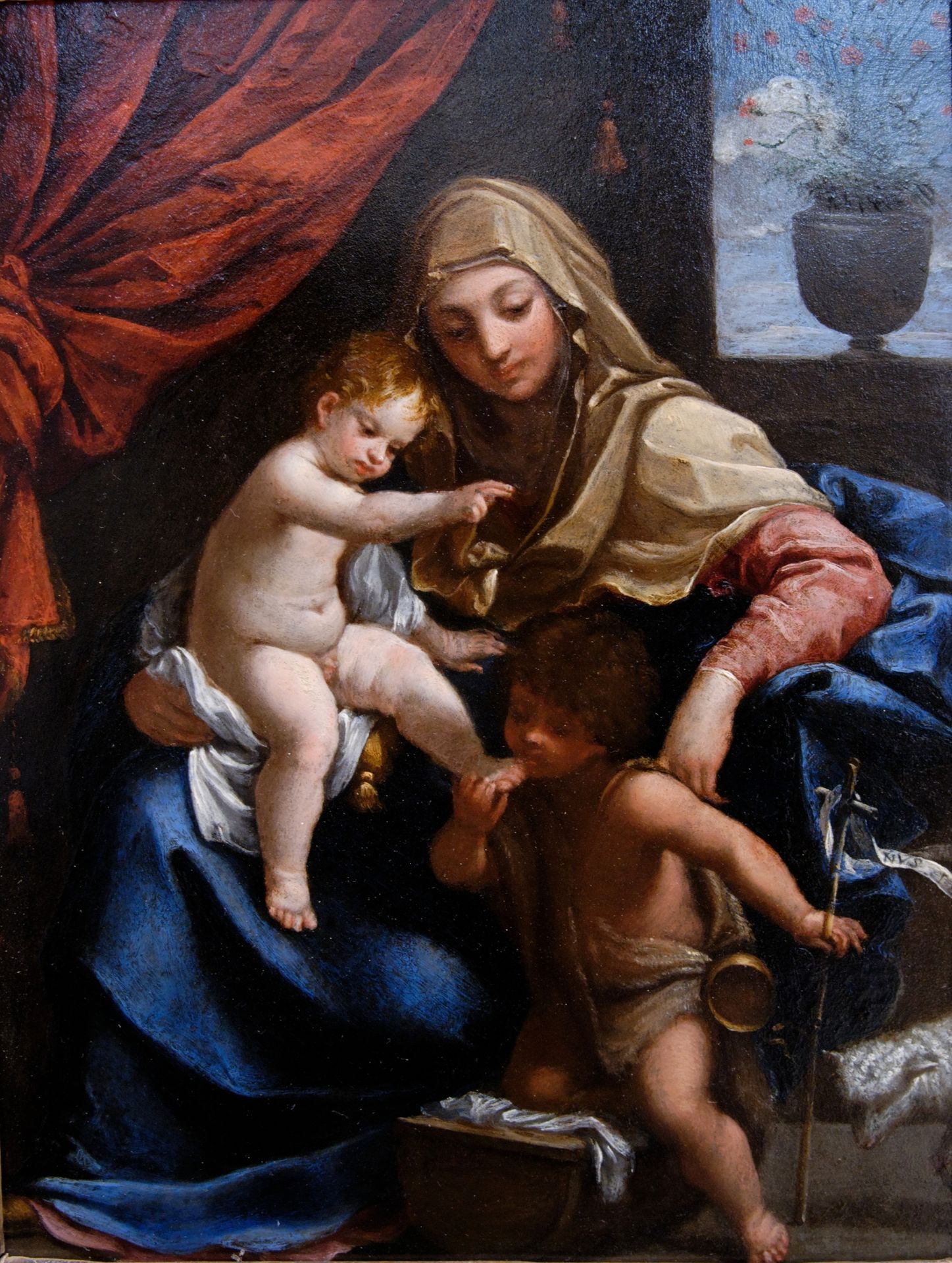 Madonna with Child and St. John the Baptist by Guido Reni