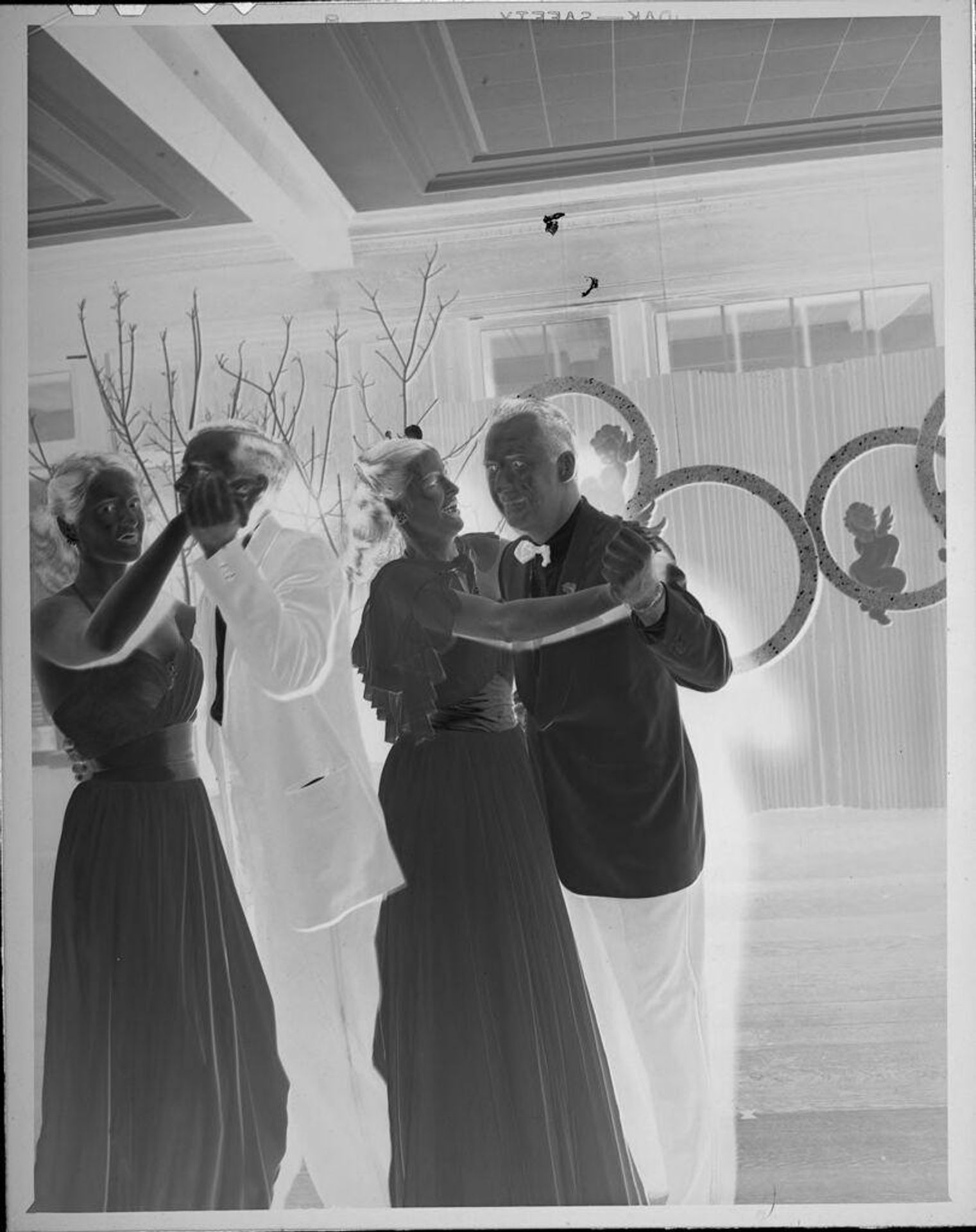 Untitled (couples dancing at fancy party) by Lucian and Mary Brown