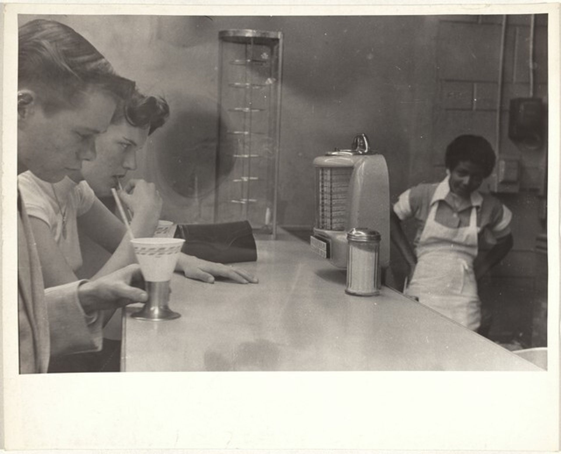 Coffee shop counter--Houston, Texas by Robert Frank