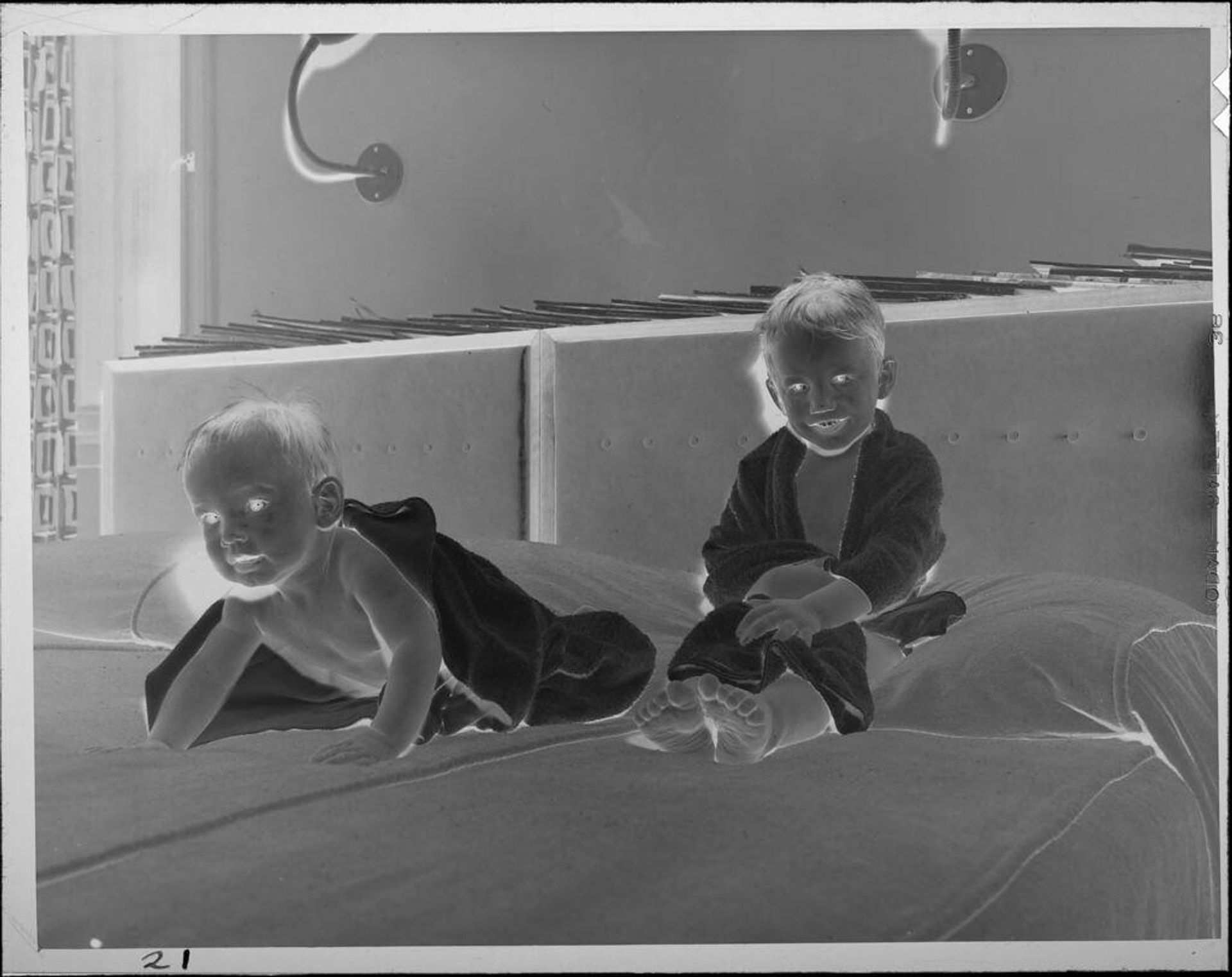 Untitled (two babies on bed after bath) by Lucian and Mary Brown