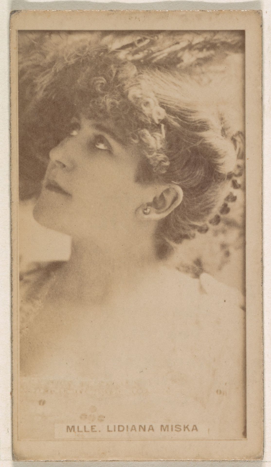 Mlle. Lidiana Miska, from the Actresses series (N245) issued by Kinney Brothers to promote Sweet Caporal Cigarettes by Kinney Brothers Tobacco Company