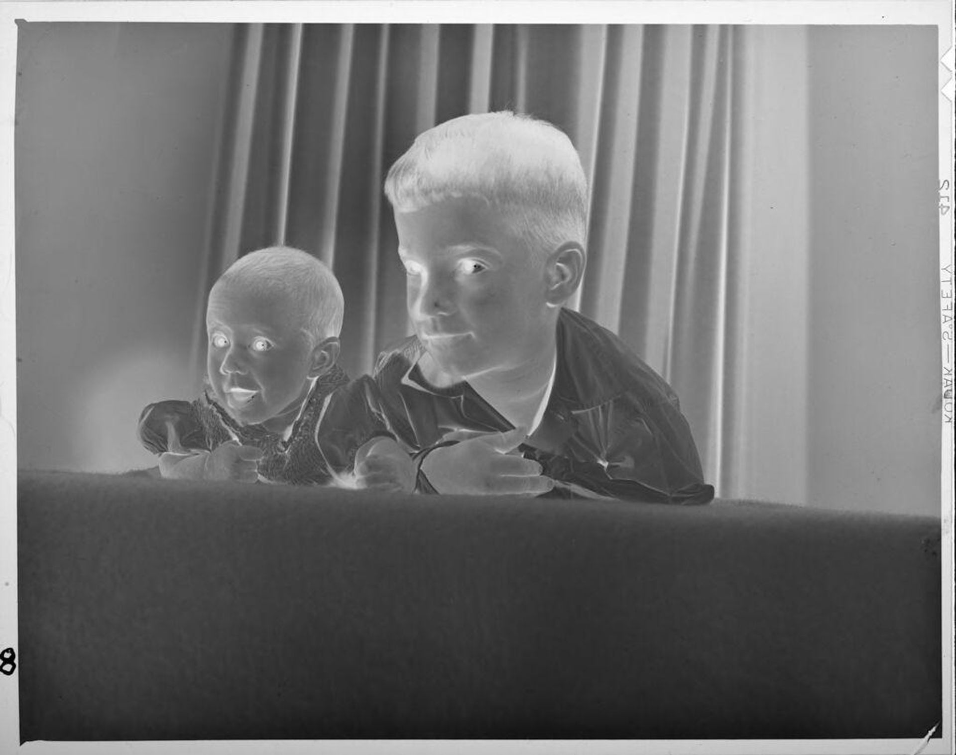 Untitled (little boy with baby) by Lucian and Mary Brown