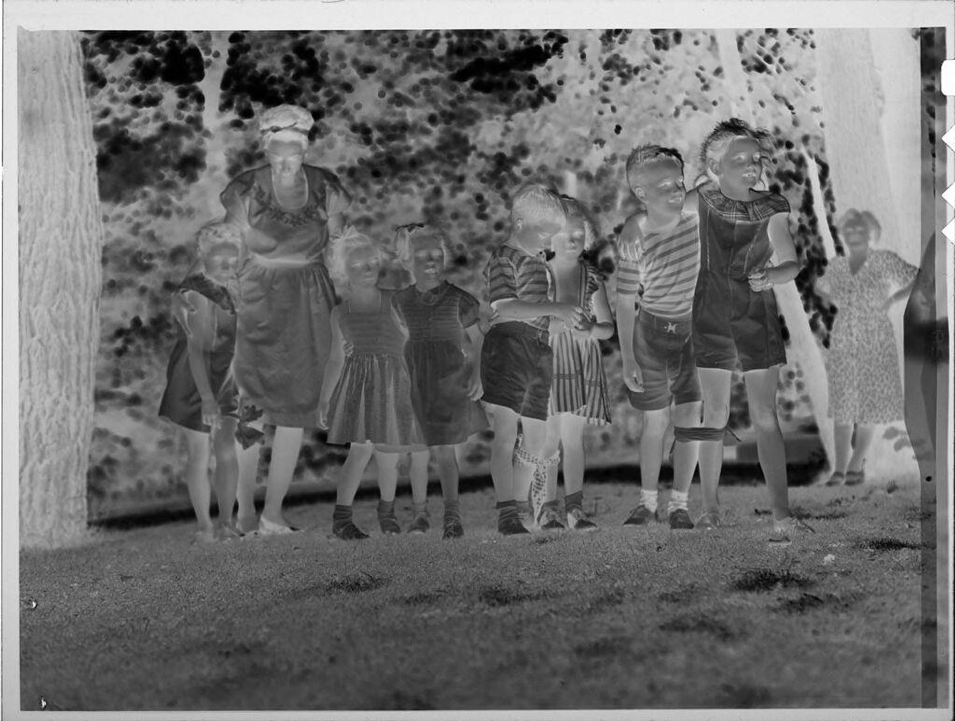 Untitled (children in three-legged race) by Lucian and Mary Brown