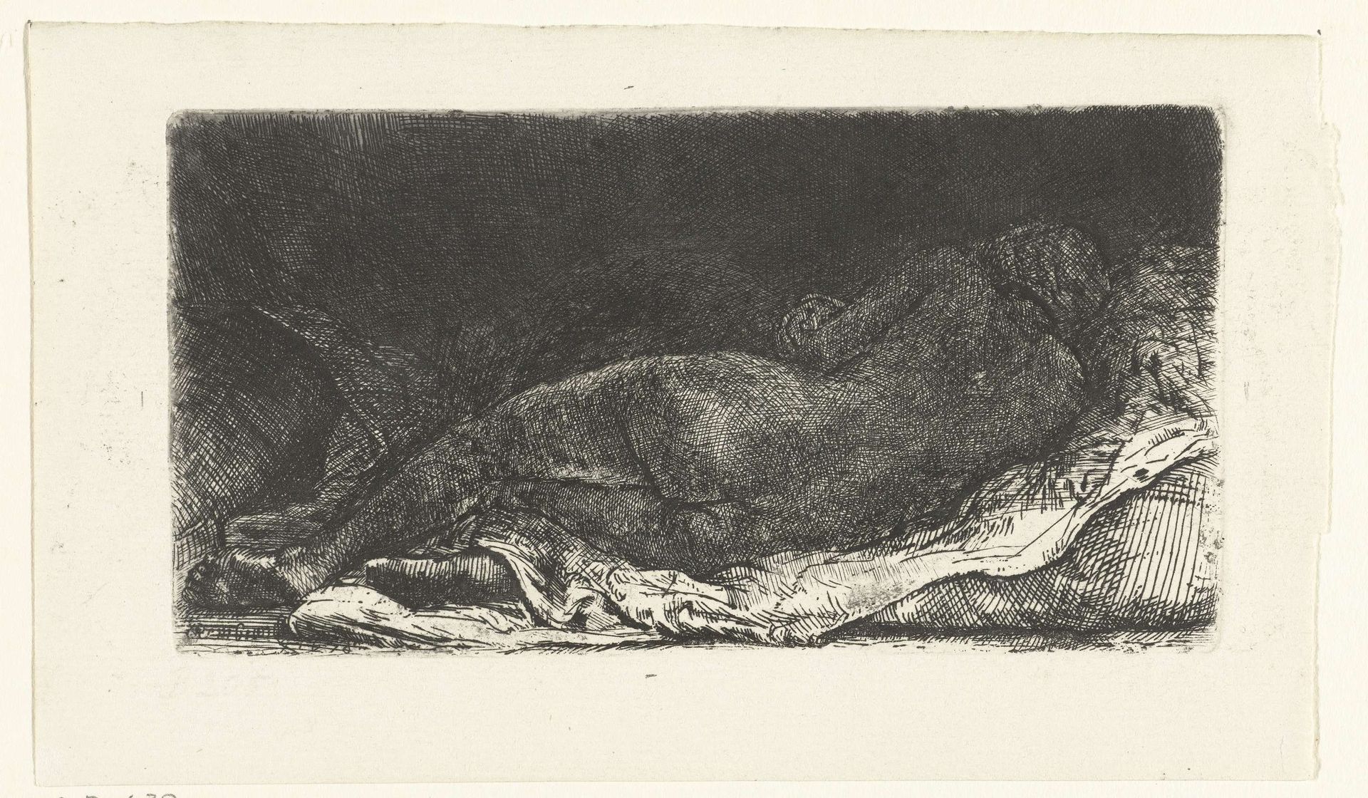 Reclining female nude by Rembrandt van Rijn