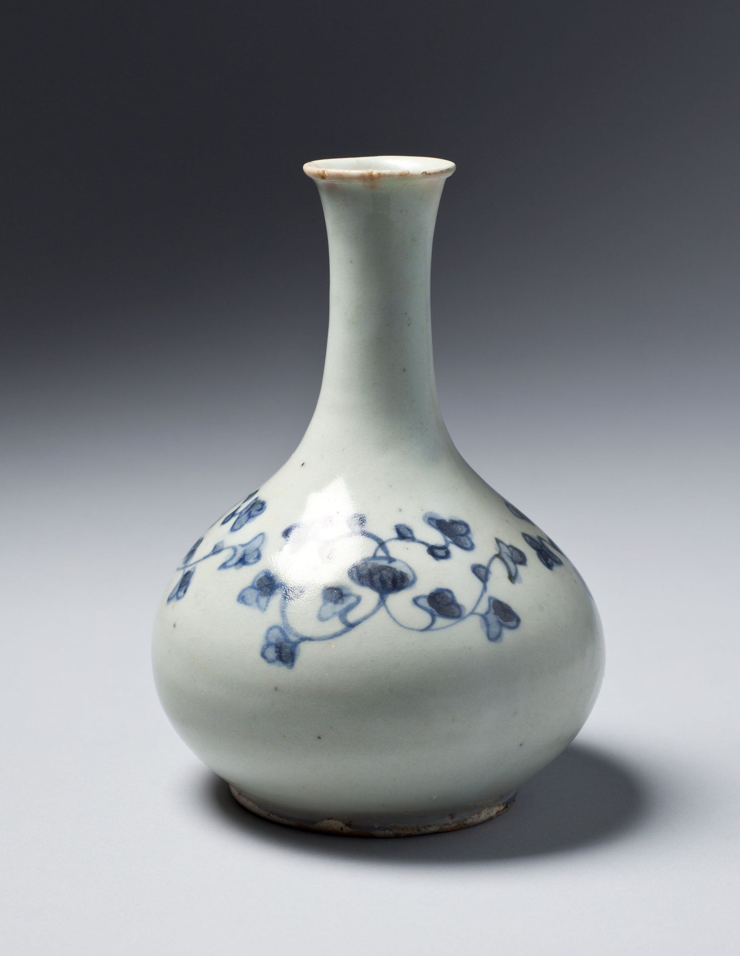 Bottle with floral scroll design by Anonymous