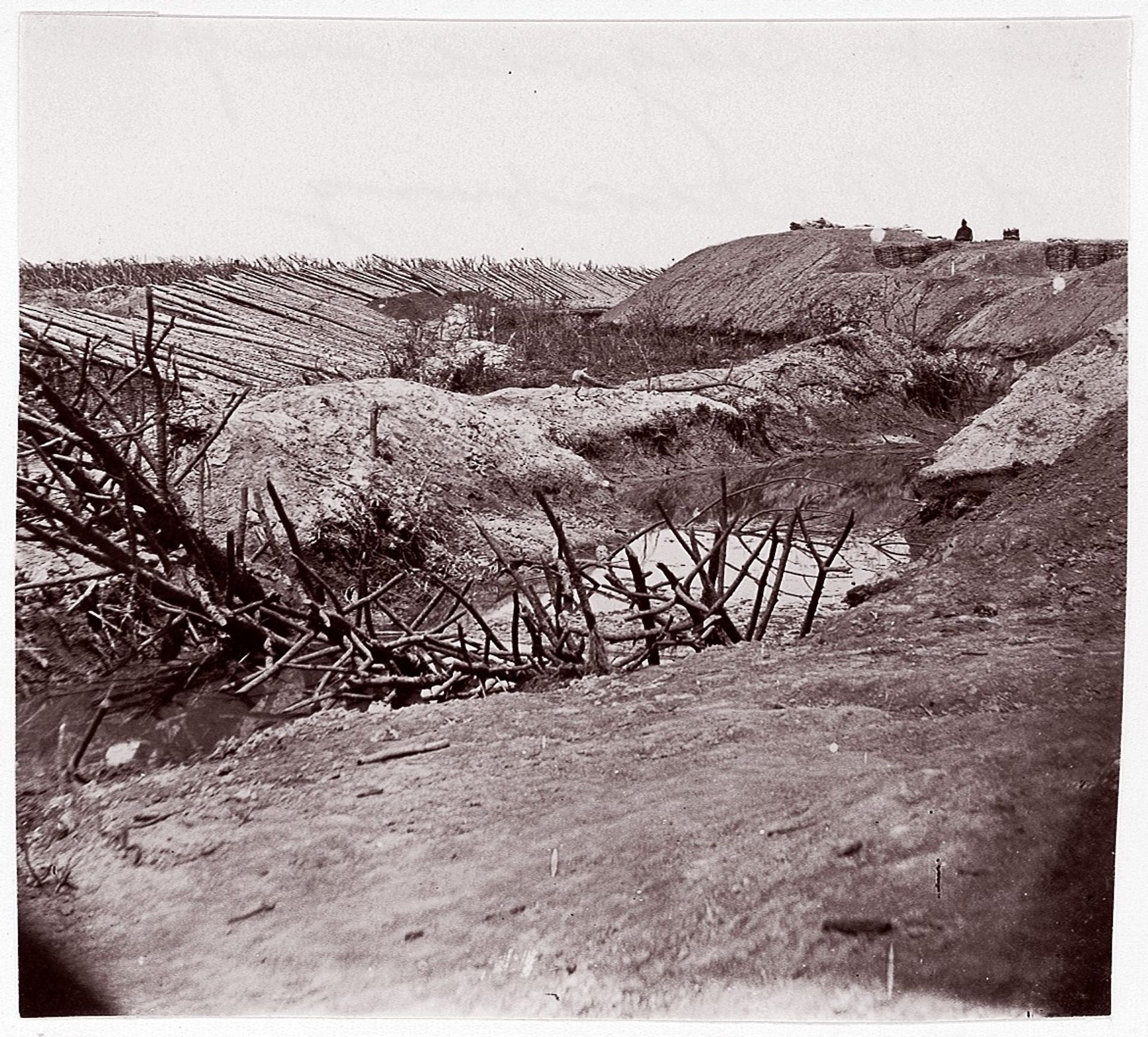 [Ditch and Chevaux-de-frise, Fort Sedgwick, in Front of Petersburg, Virginia] by Timothy O'Sullivan