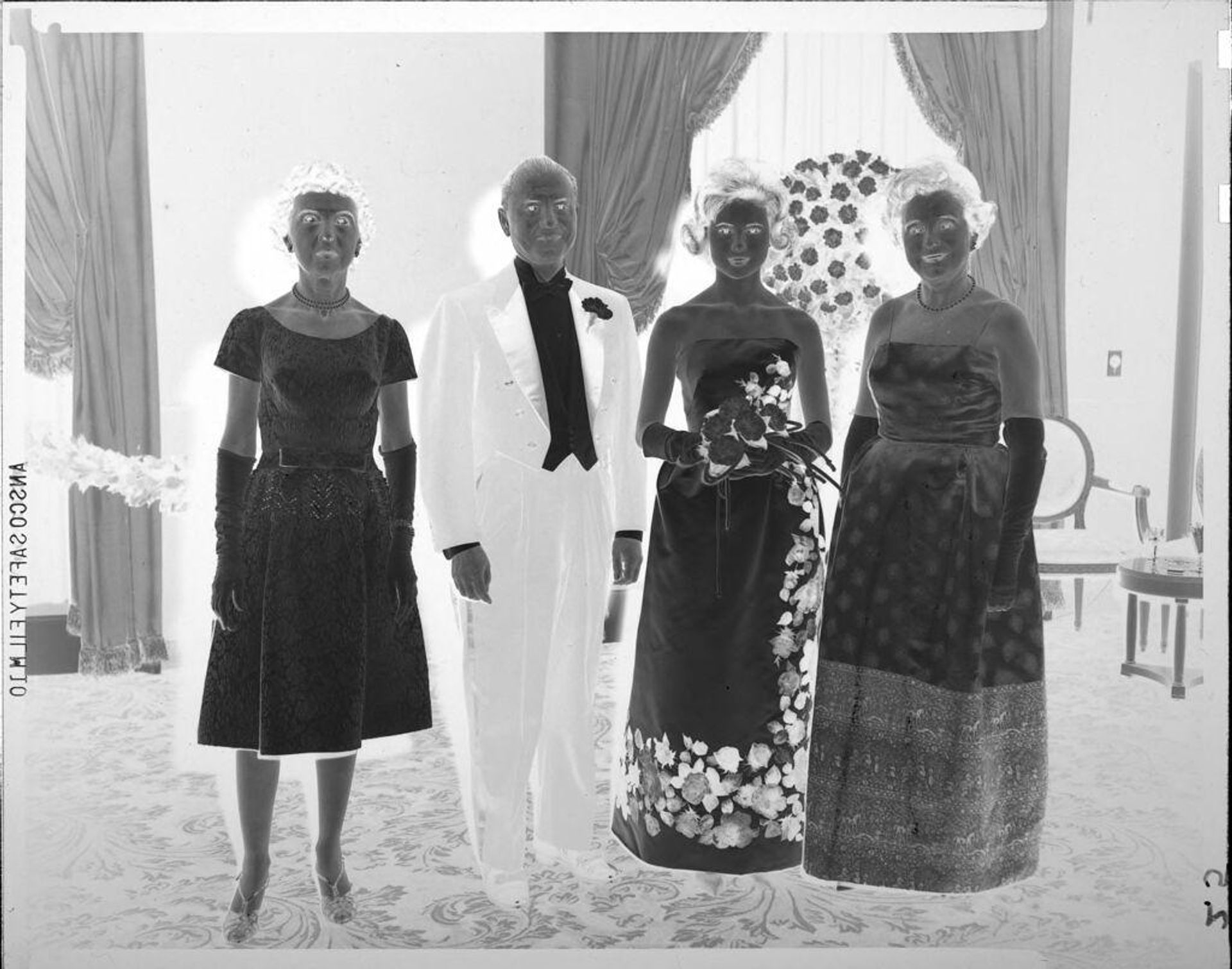 Untitled (young woman with three adults at ball) by John Howell