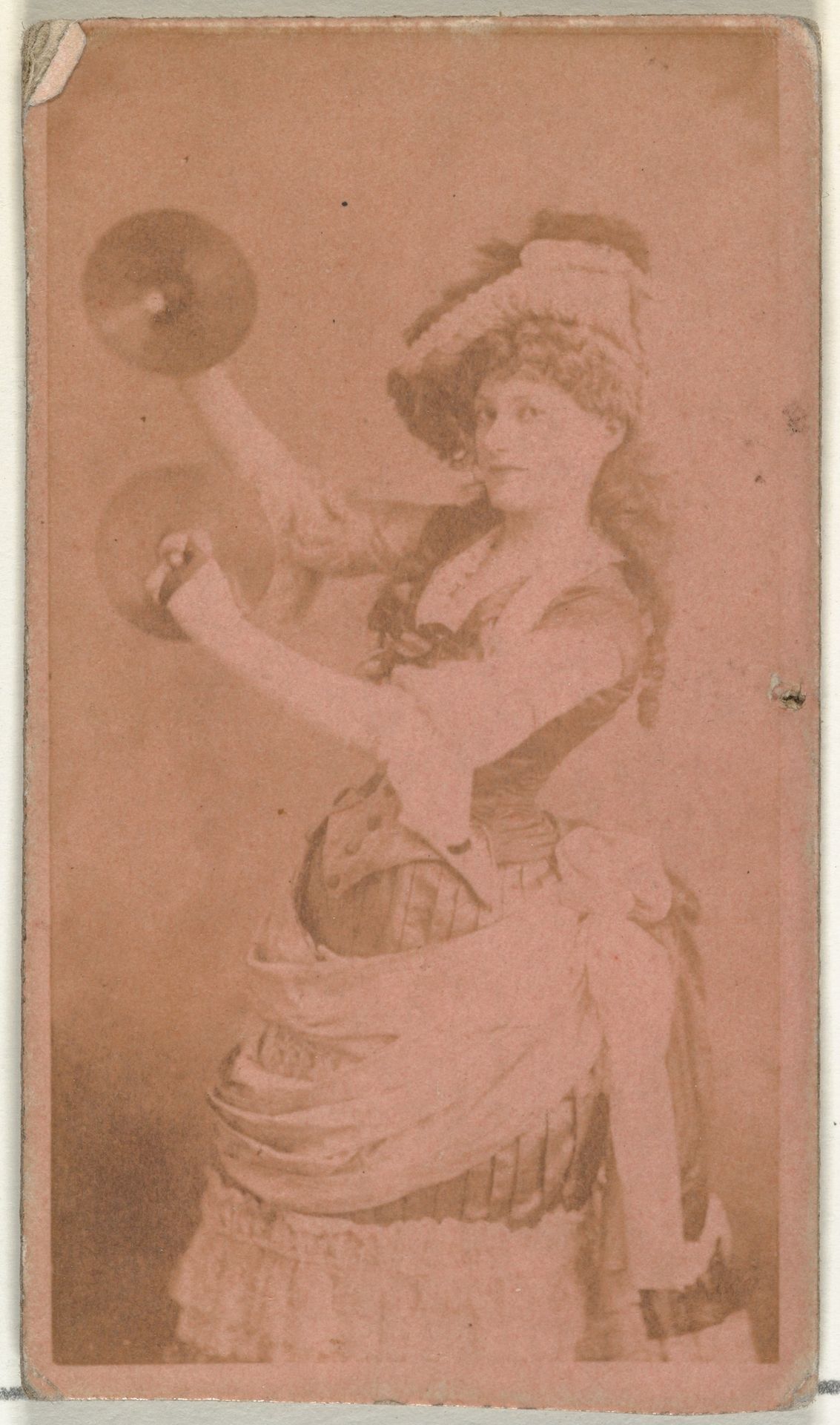 [Actress playing two cymbals], from the Actors and Actresses series (N145-8) issued by Duke Sons & Co. to promote Duke Cigarettes by W. Duke, Sons & Co.
