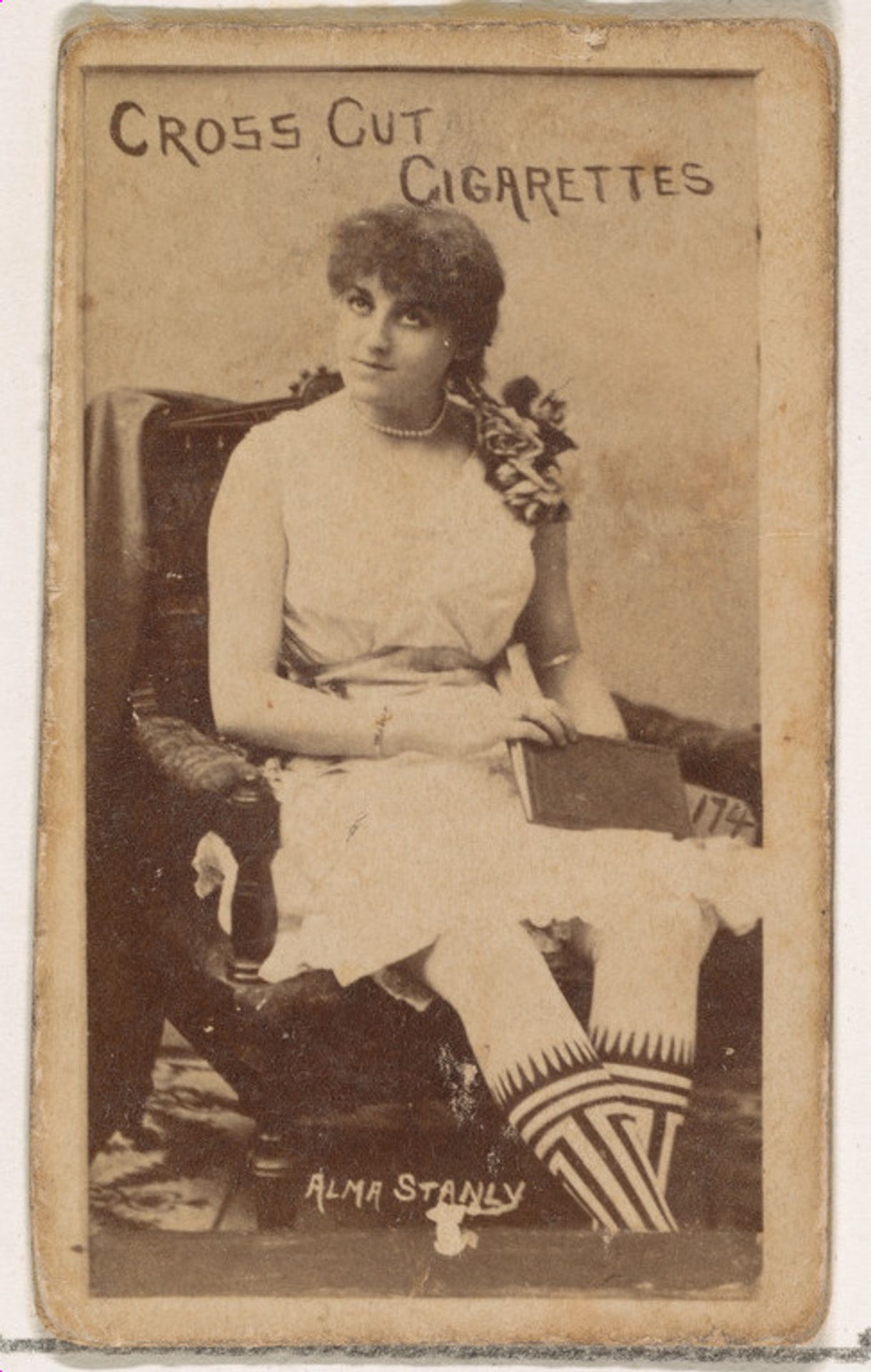 Card Number 174, Alma Stanley, from the Actors and Actresses series (N145-1) issued by Duke Sons & Co. to promote Cross Cut Cigarettes by W. Duke, Sons & Co.