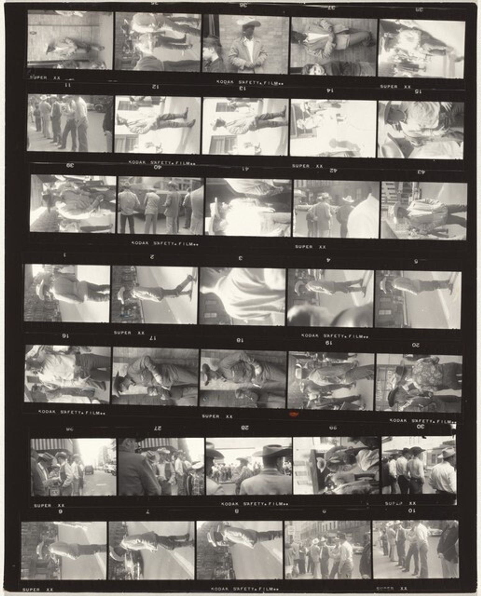 Cowboys no number by Robert Frank