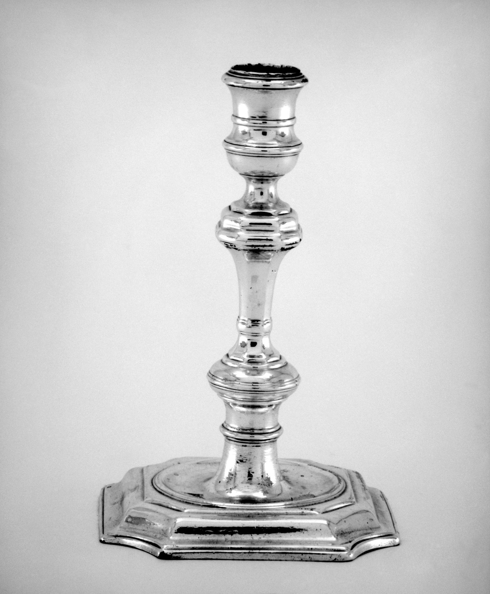 Pair of candlesticks by Paul de Lamerie