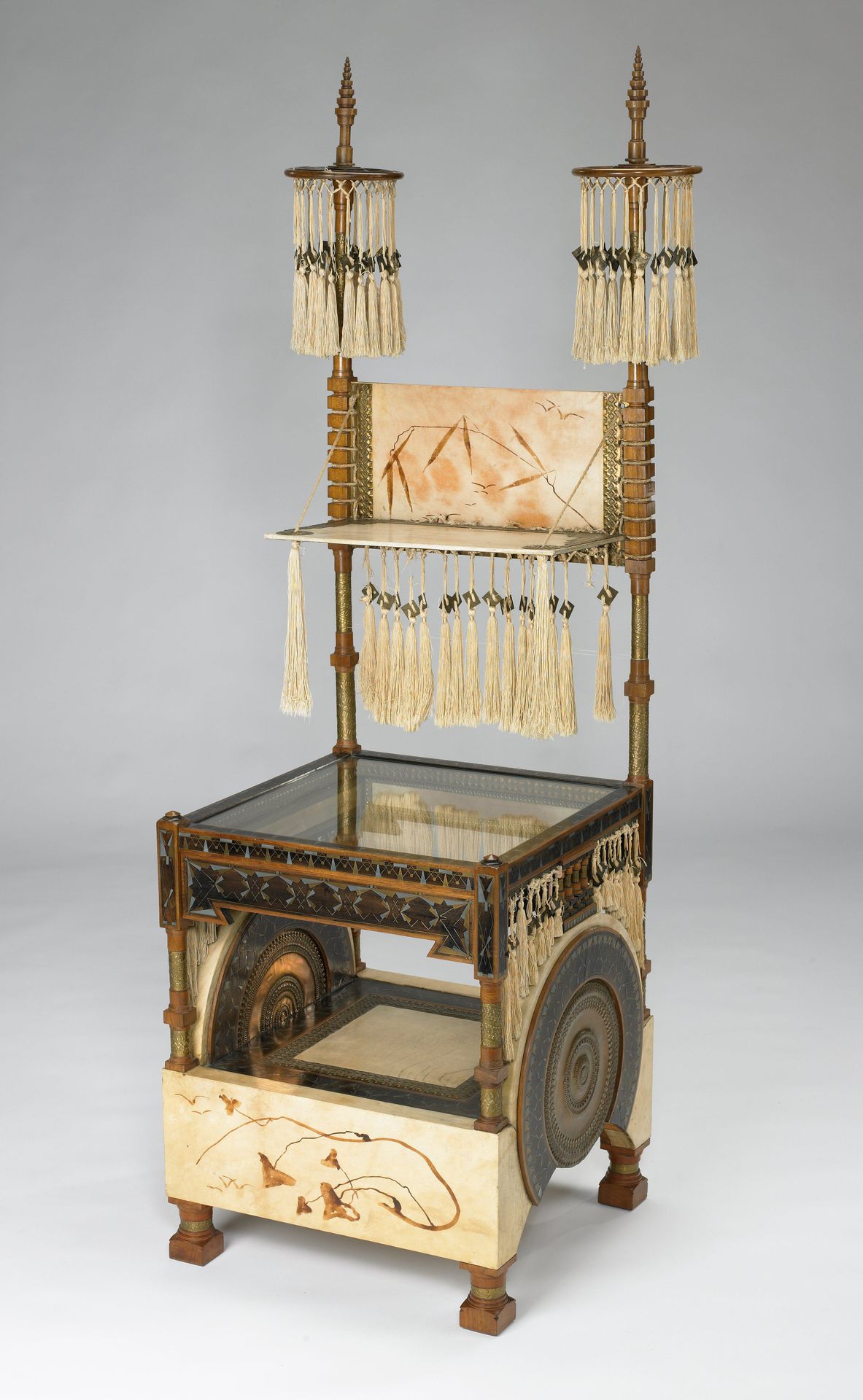 Collector's cabinet and chair by Carlo Bugatti