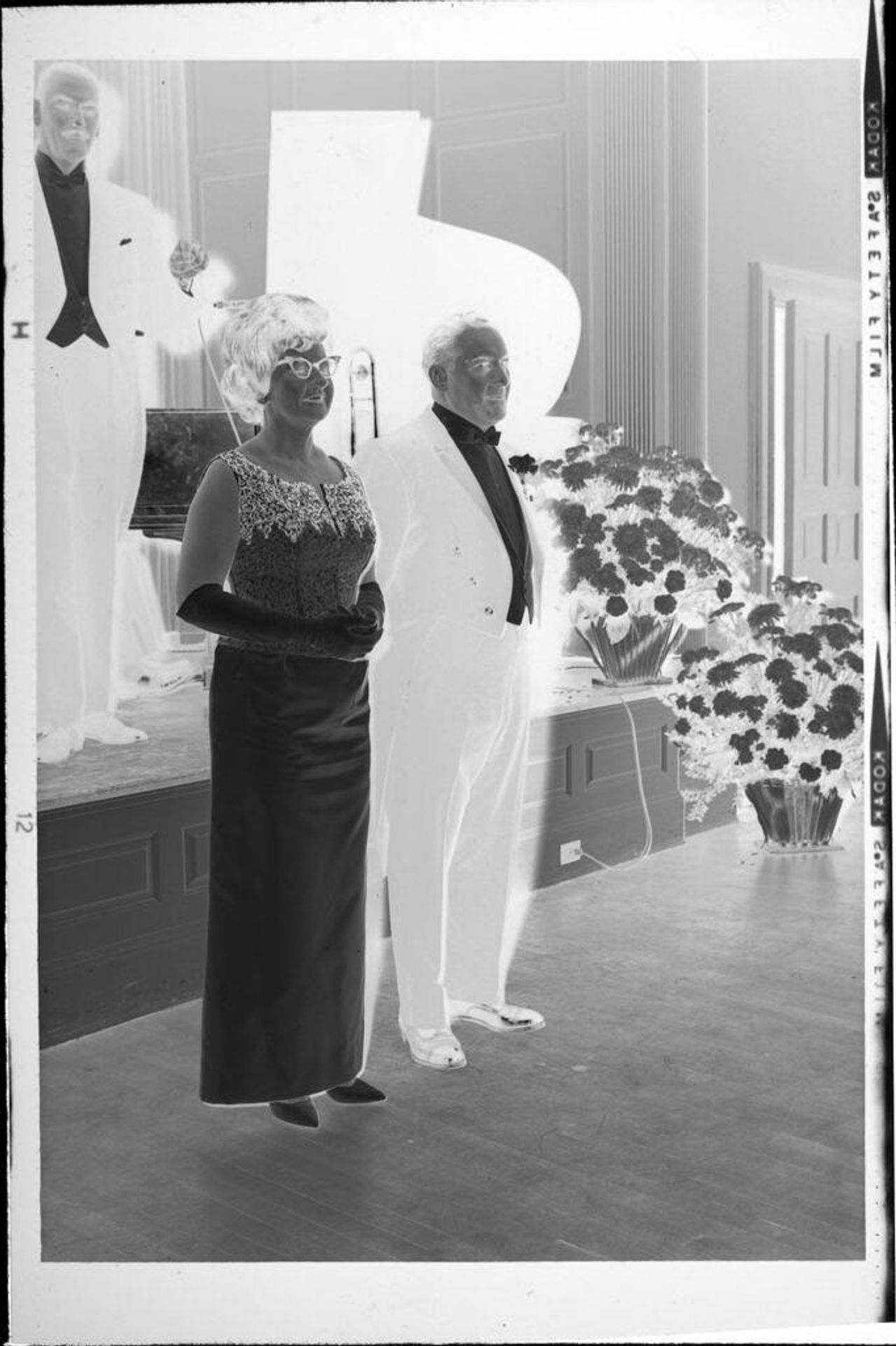 Untitled (couple on dance floor at ball) by Robert Burian
