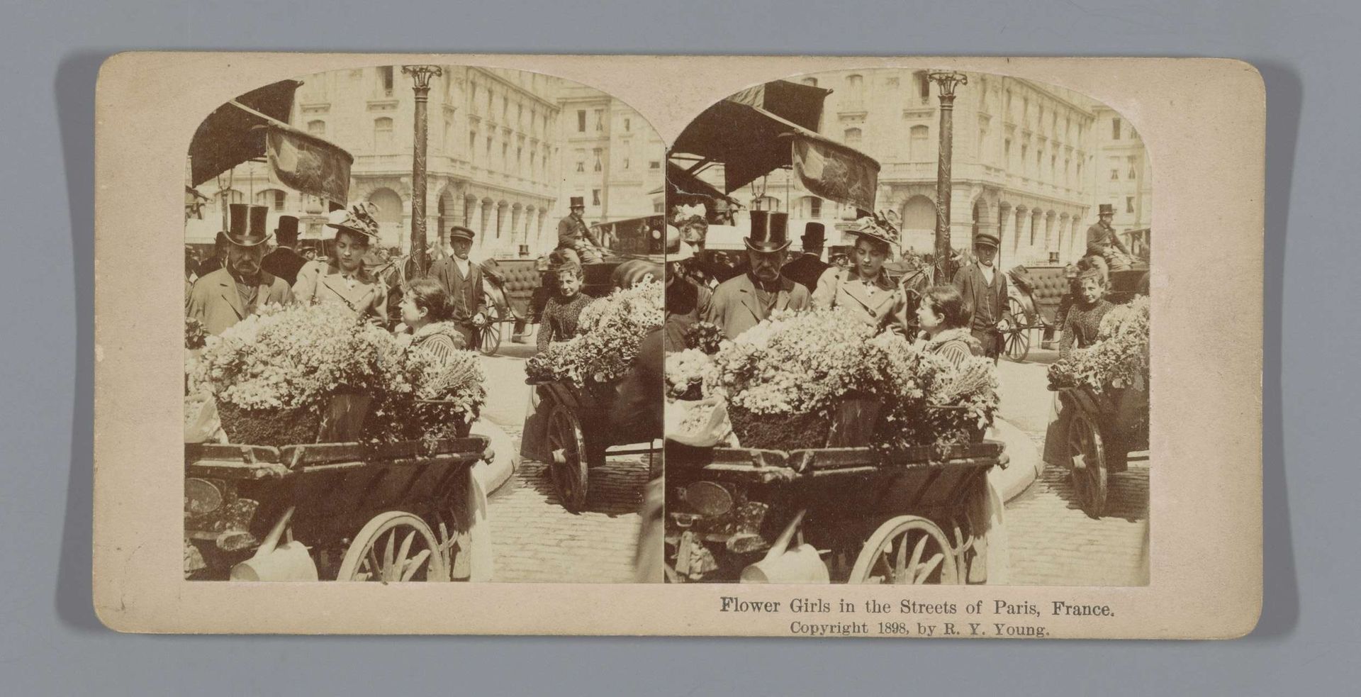 Flower Girls in the Streets of Paris, France by R.Y. Young