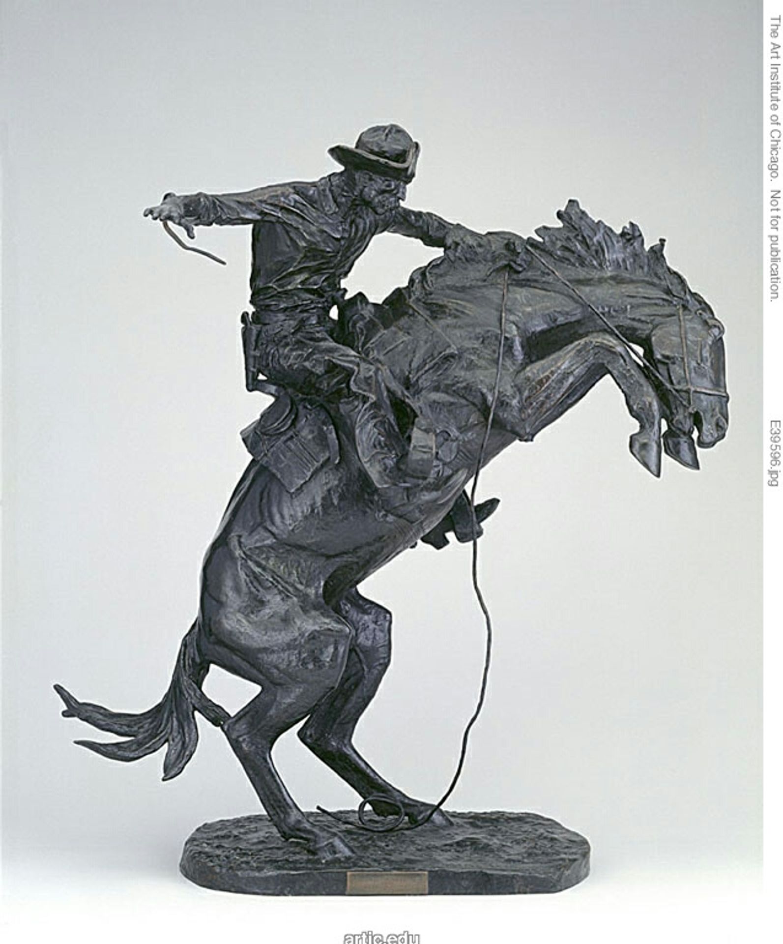 The Bronco Buster by Frederic Remington