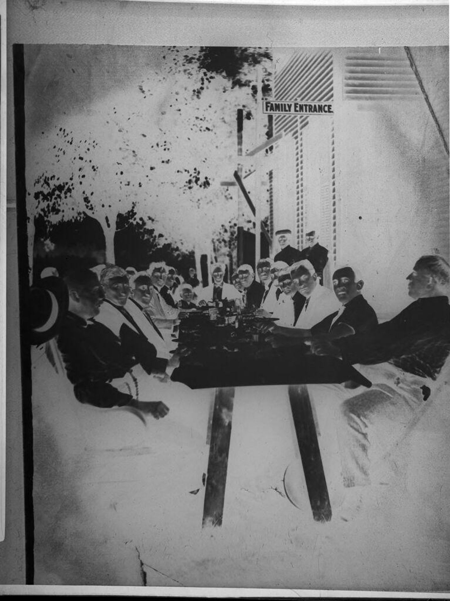 Untitled (rephotograph of picture of group of men at table) by Harris & Ewing