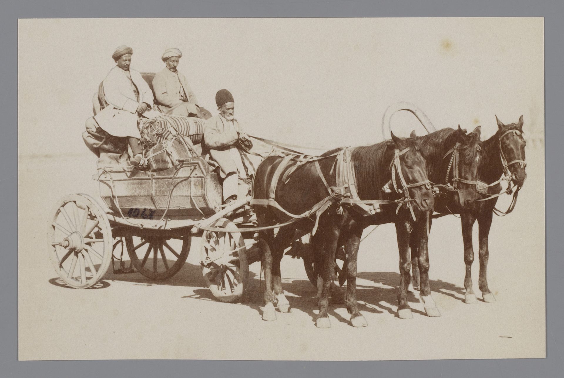 Drie mannen in een paard en wagen, Iran [?] by Antoine Sevruguin