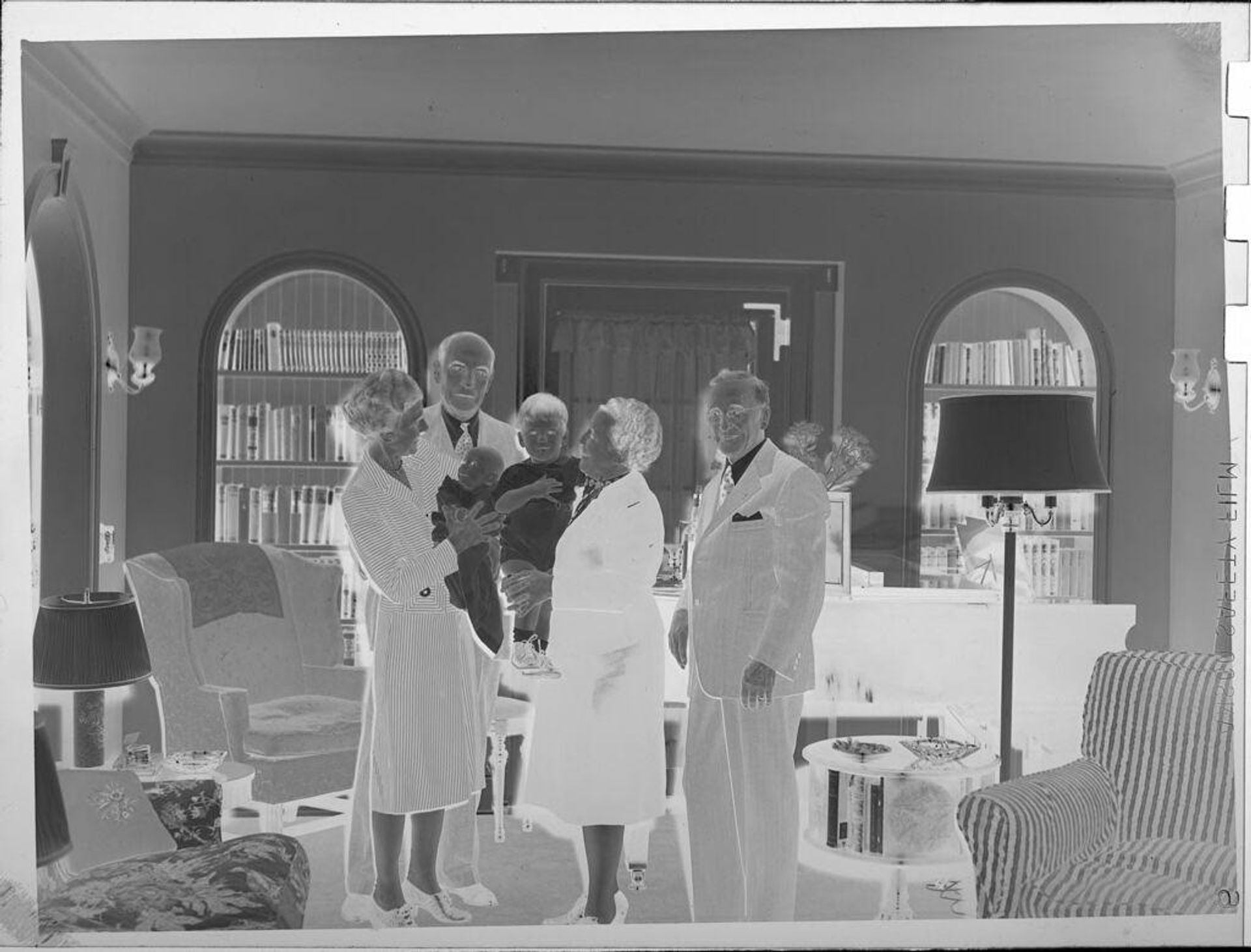 Untitled (family portrait in living room) by Lucian and Mary Brown