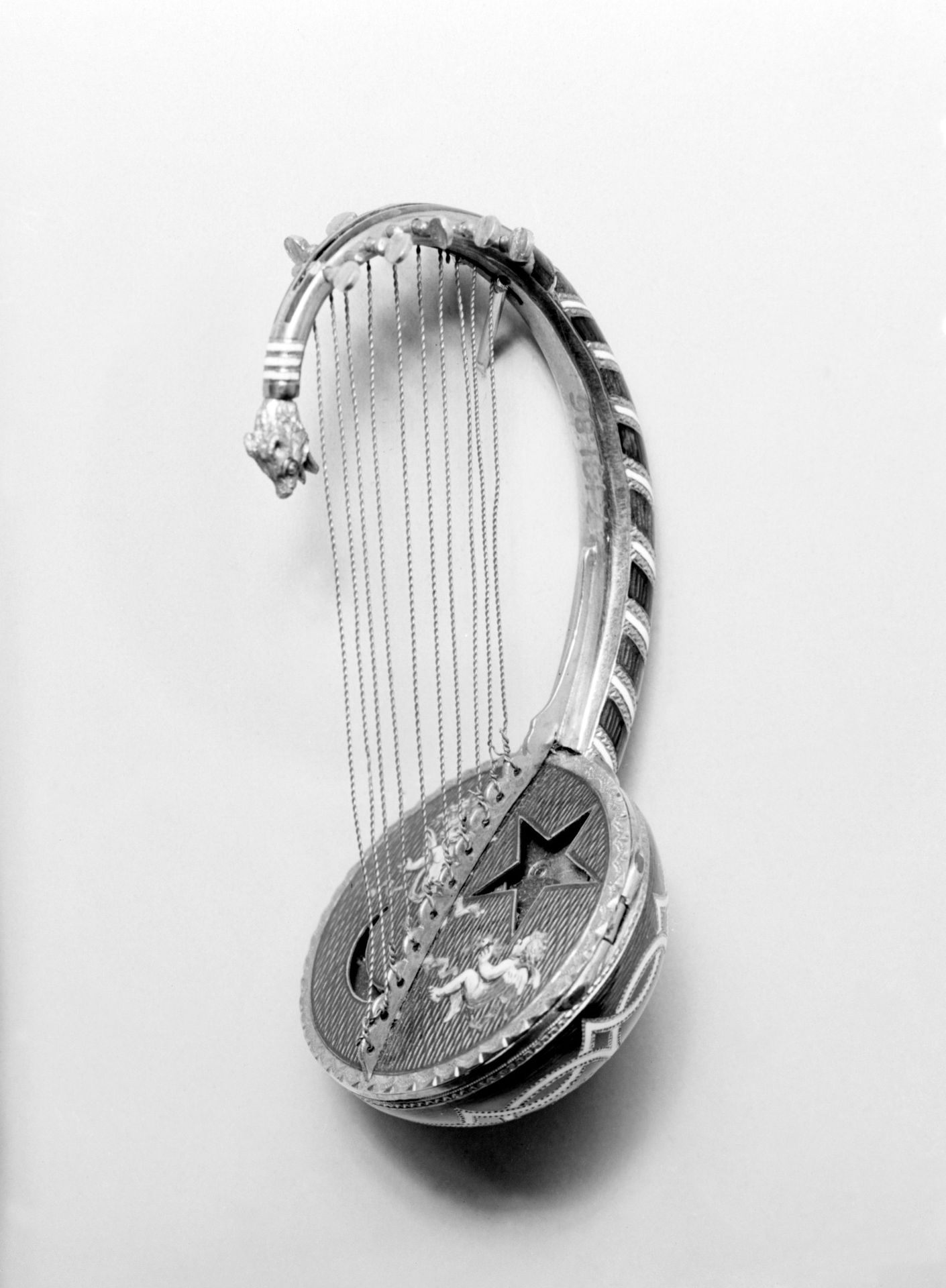 Watch in the form of an Egyptian lyre by Philippe Meynadier