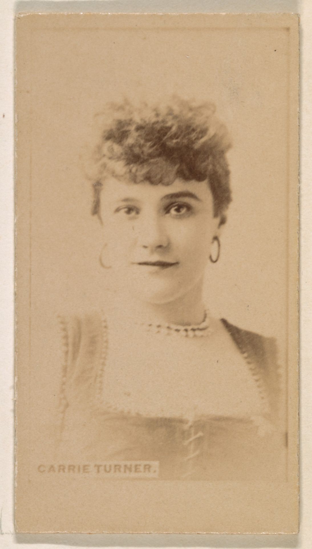 Carrie Turner, from the Actresses series (N245) issued by Kinney Brothers to promote Sweet Caporal Cigarettes by Kinney Brothers Tobacco Company