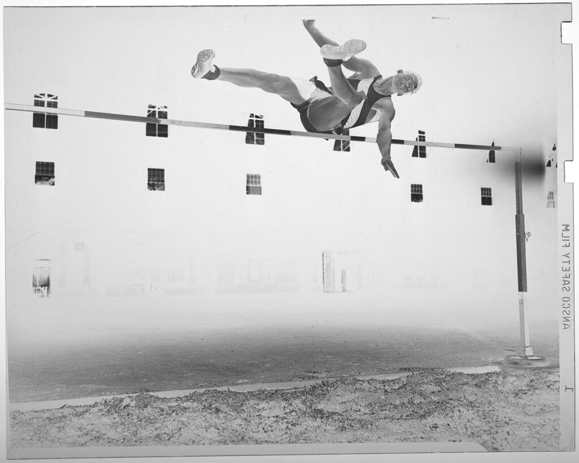 Untitled (high-jumper jumping over bar) by Jack Gould
