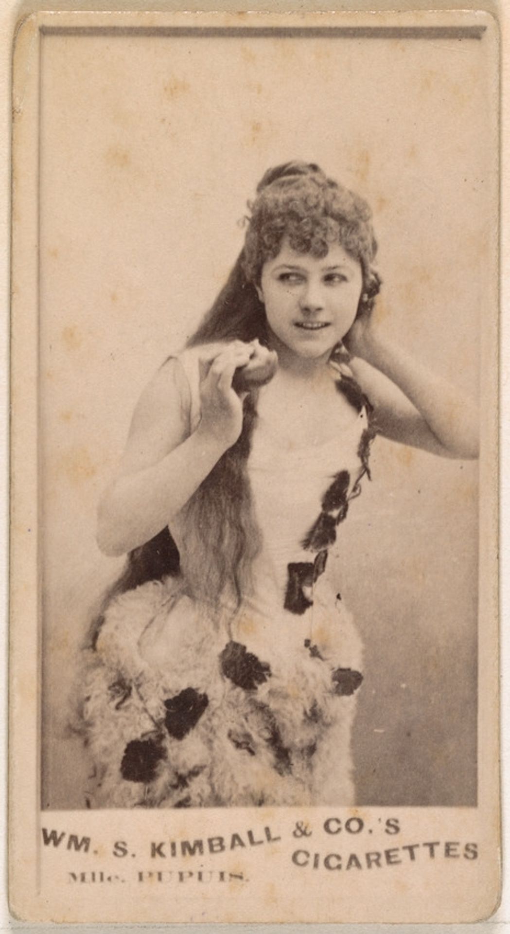 Mlle. Pupuis, from the Actresses series (N203) issued by Wm. S. Kimball & Co. by William S. Kimball & Company
