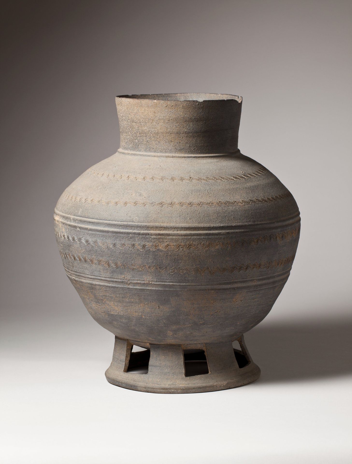Long-necked jar with perforated foot by Anonymous
