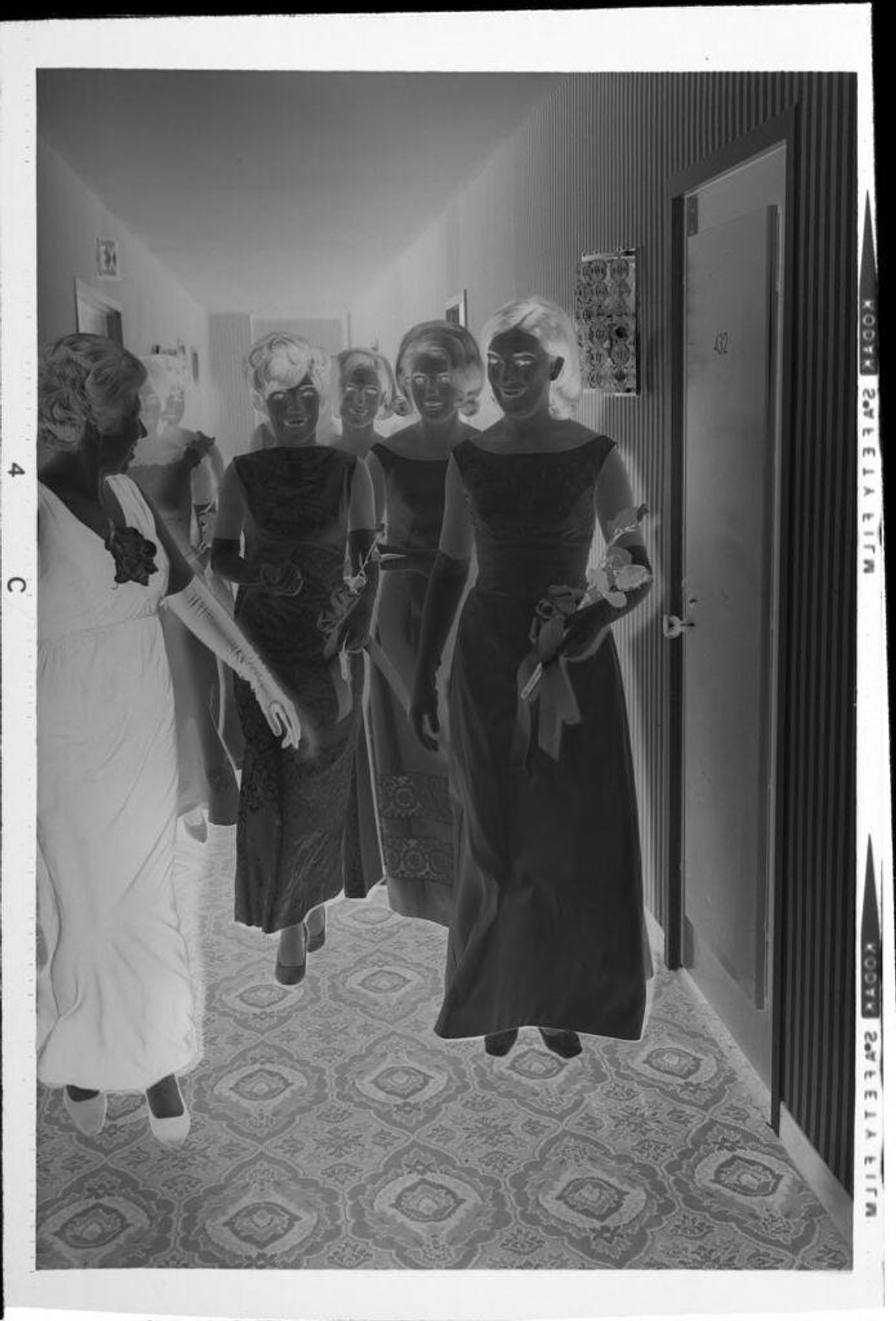 Untitled (debutantes in hallway) by Robert Burian