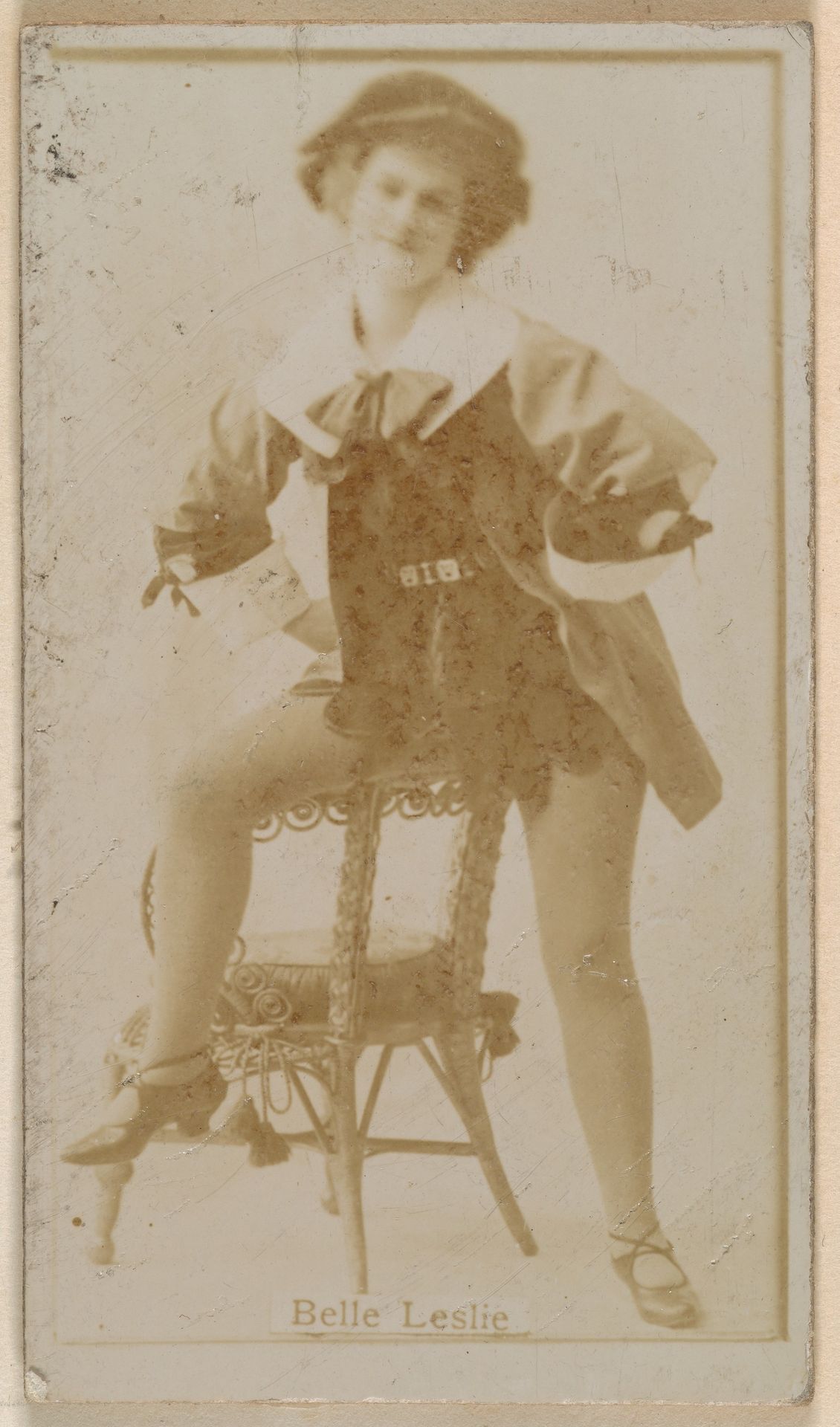 Belle Leslie, from the Actresses series (N245) issued by Kinney Brothers to promote Sweet Caporal Cigarettes by Kinney Brothers Tobacco Company