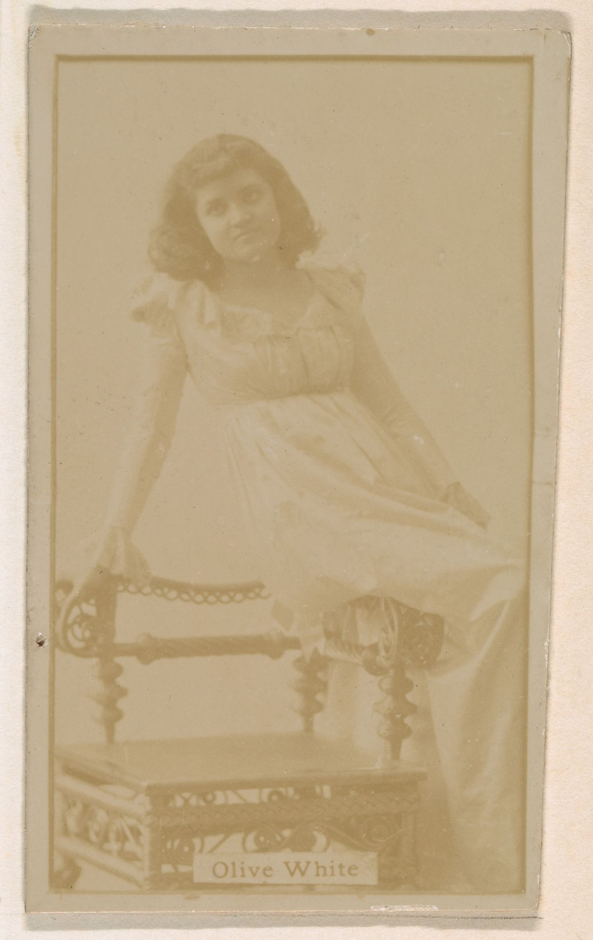 Olive White, from the Actresses series (N245) issued by Kinney Brothers to promote Sweet Caporal Cigarettes by Kinney Brothers Tobacco Company