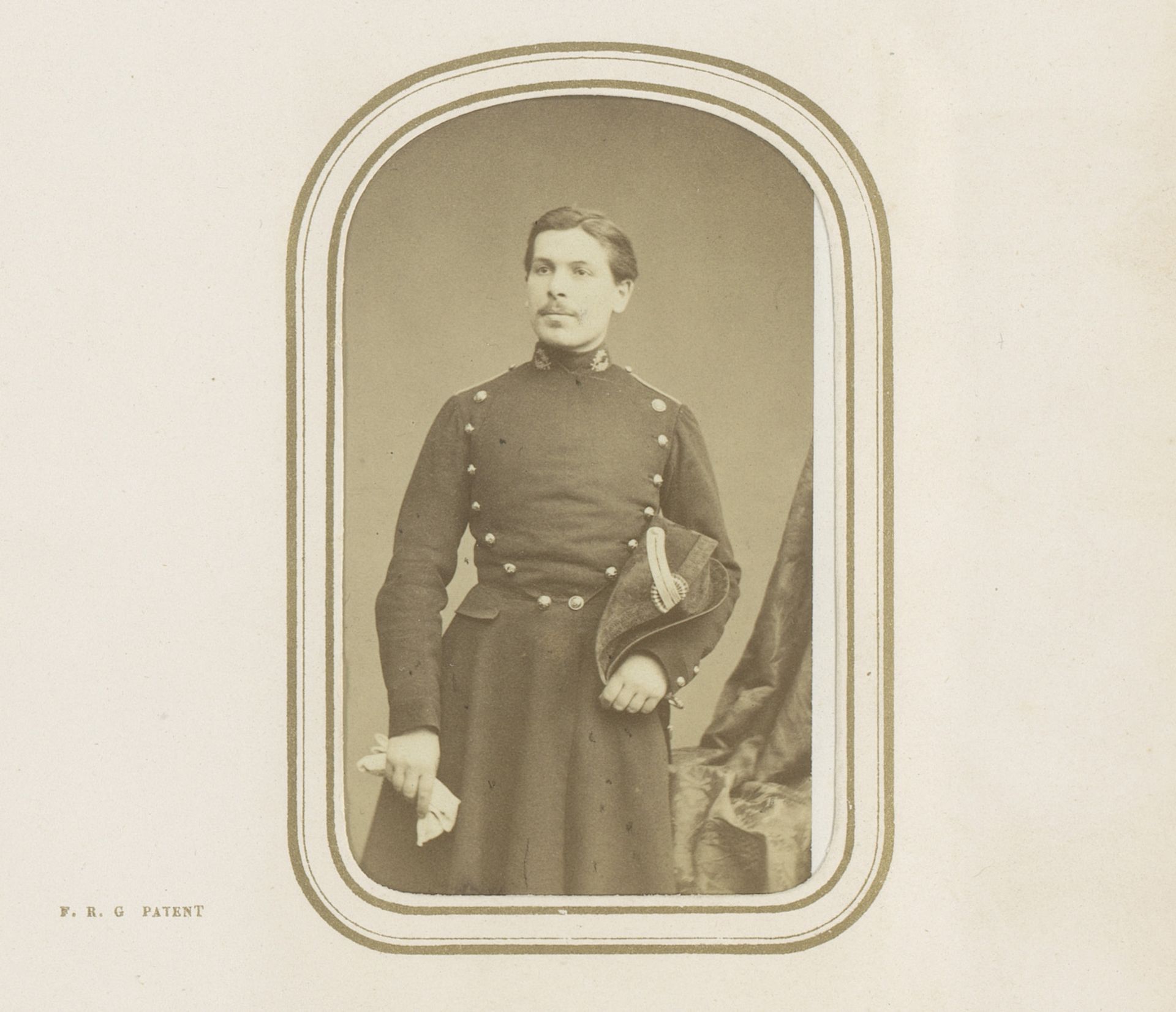 Portret van een man in uniform by Eugène Hallier