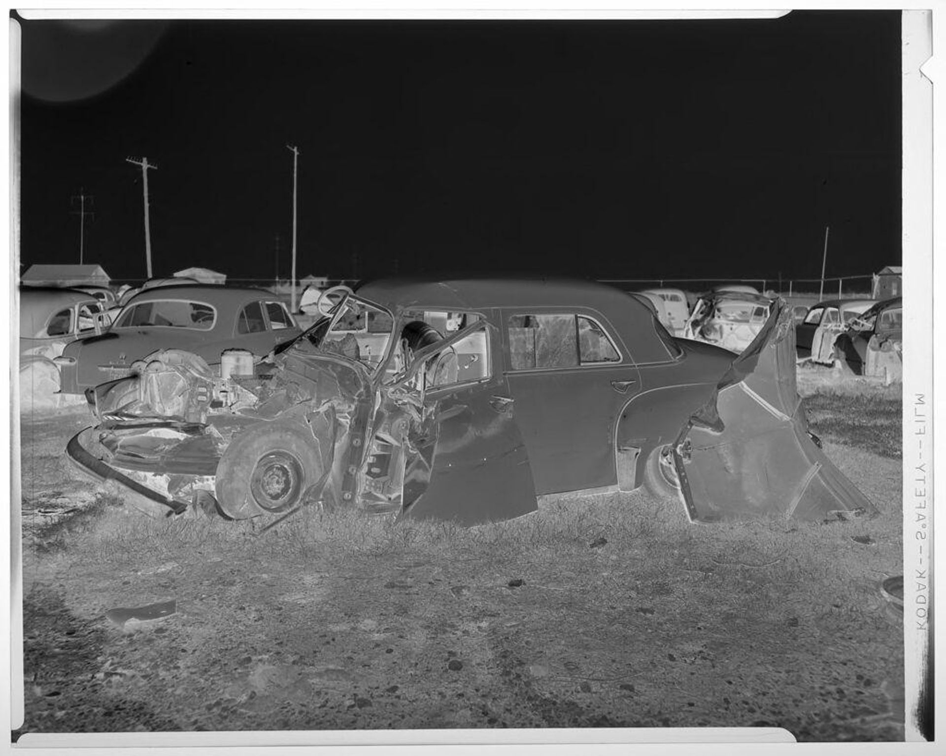 Untitled (wrecked car) by Harry Annas