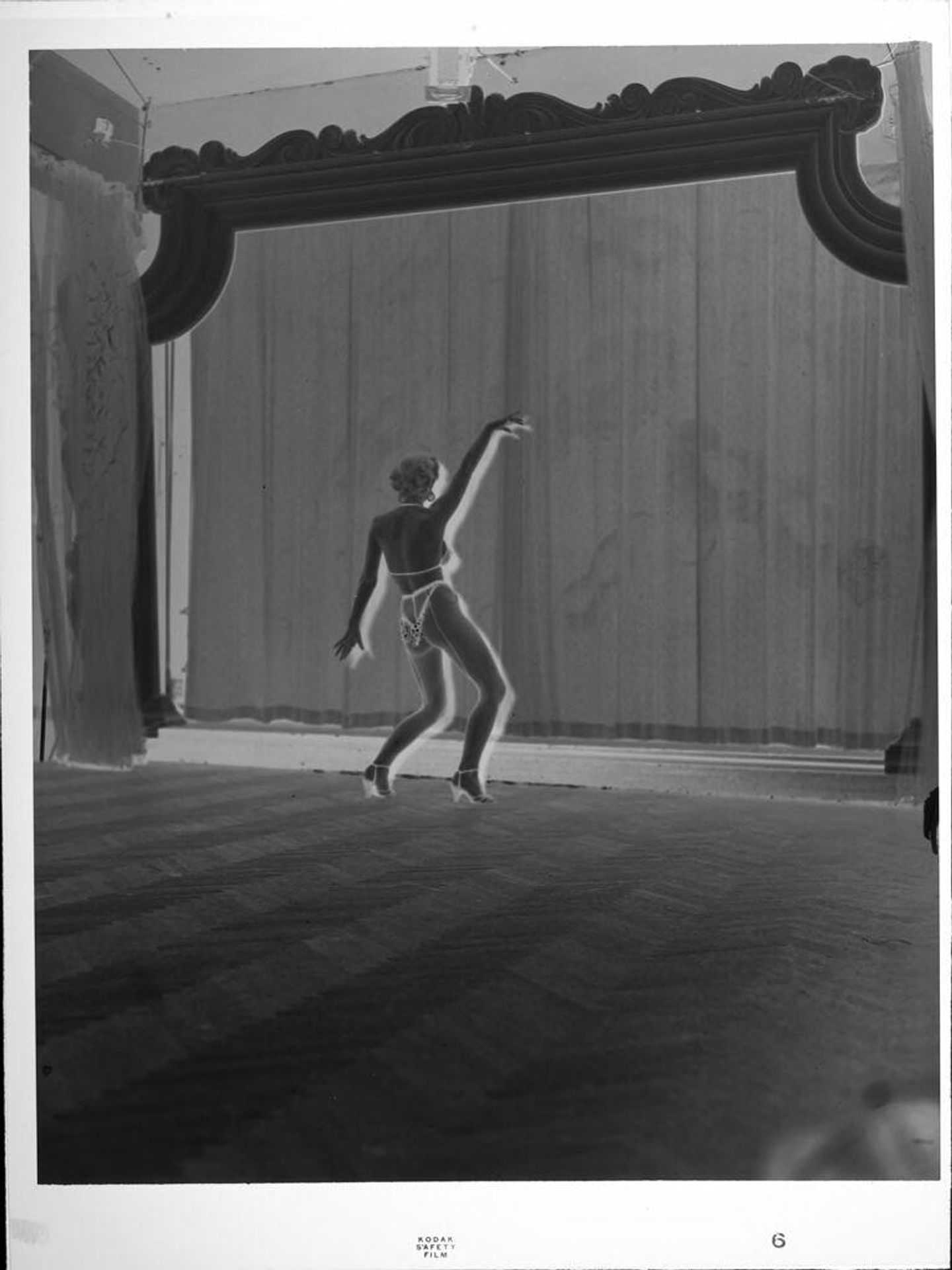 Untitled (female performer on stage) by Peter James Studio