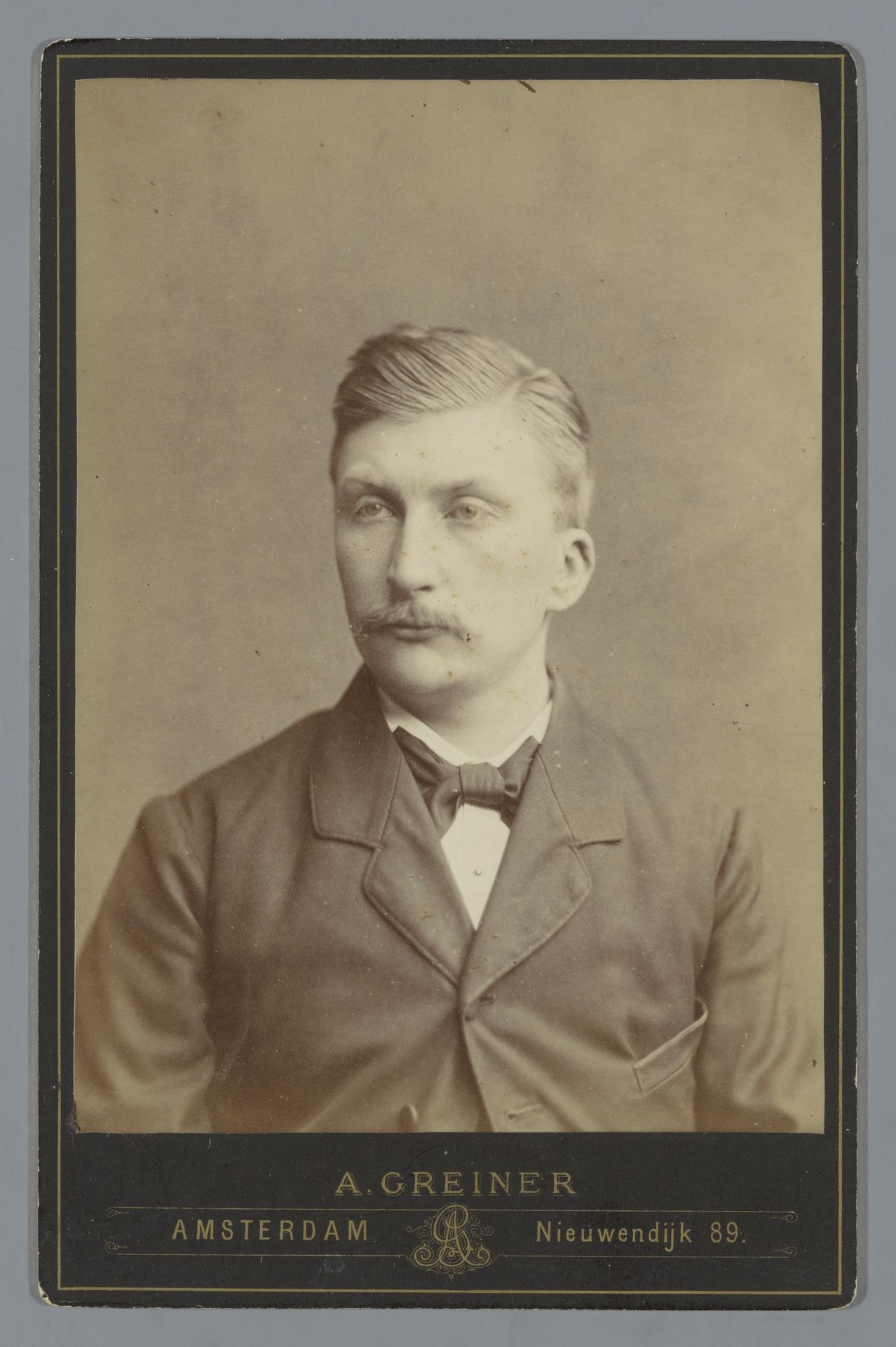 Portret van een onbekende man met een snor by Albert Greiner