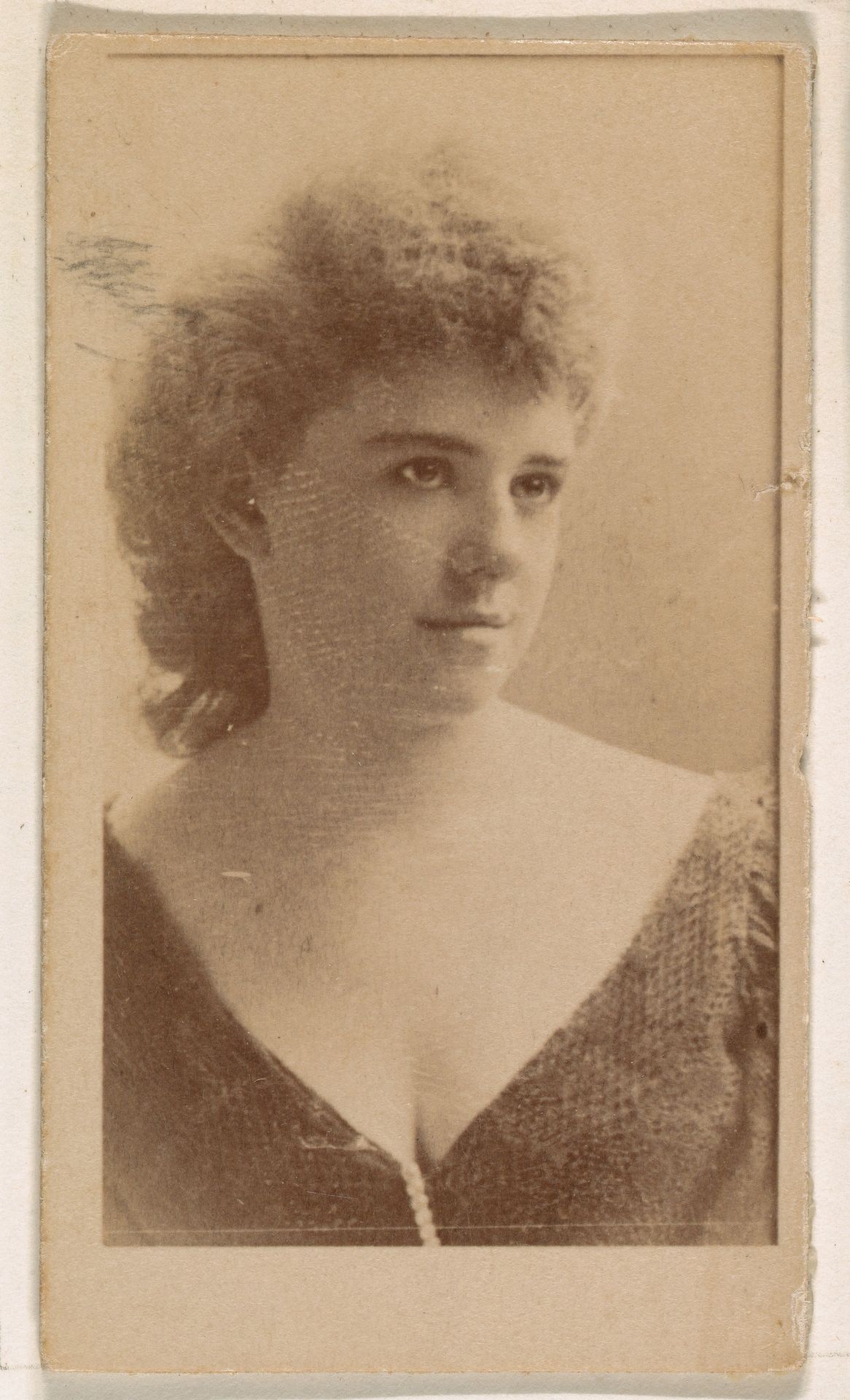 Actress with curly hair, from the Actresses series (N245) issued by Kinney Brothers to promote Sweet Caporal Cigarettes by Kinney Brothers Tobacco Company