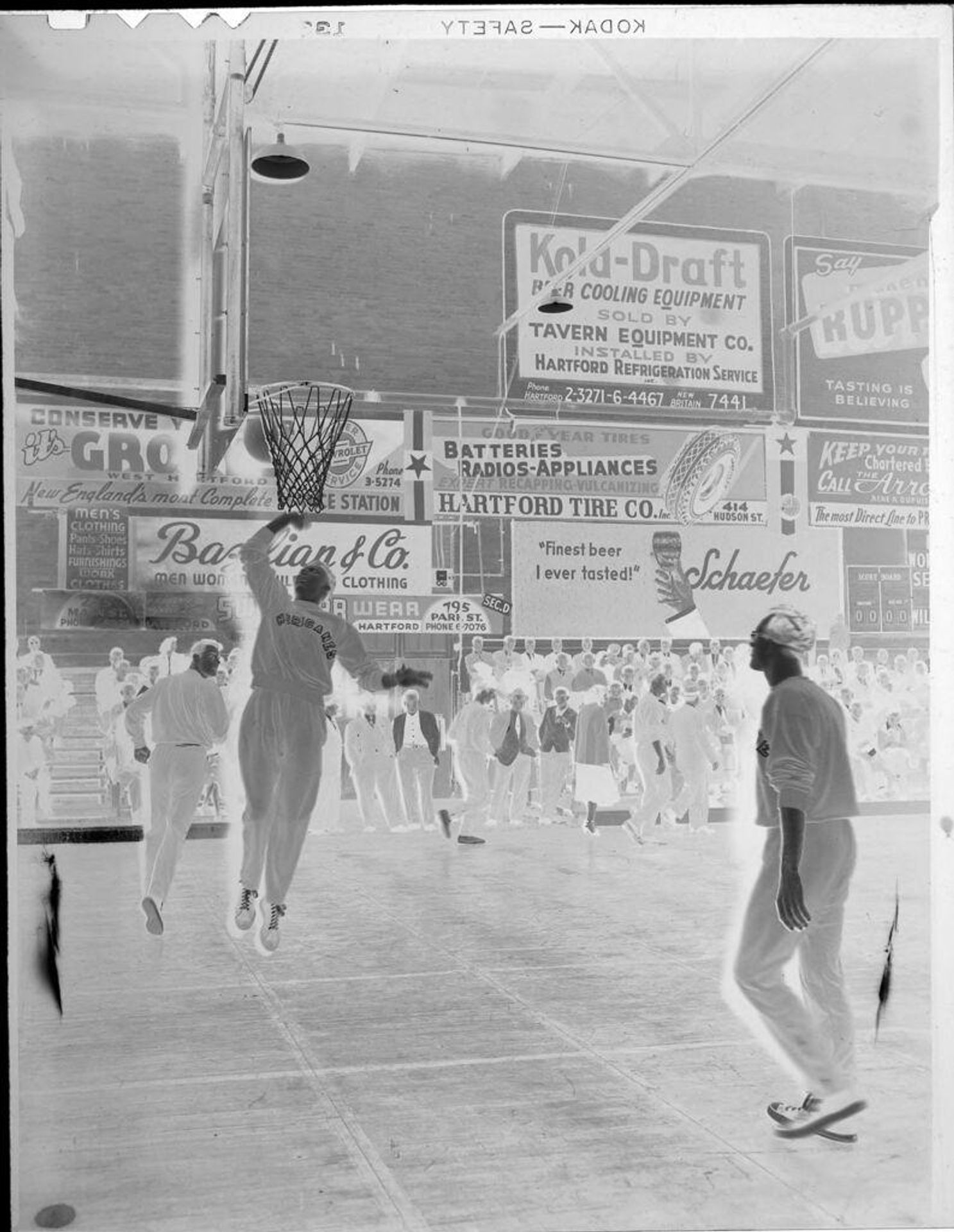 Untitled (men playing basketball, crowd watching) by Robert Burian