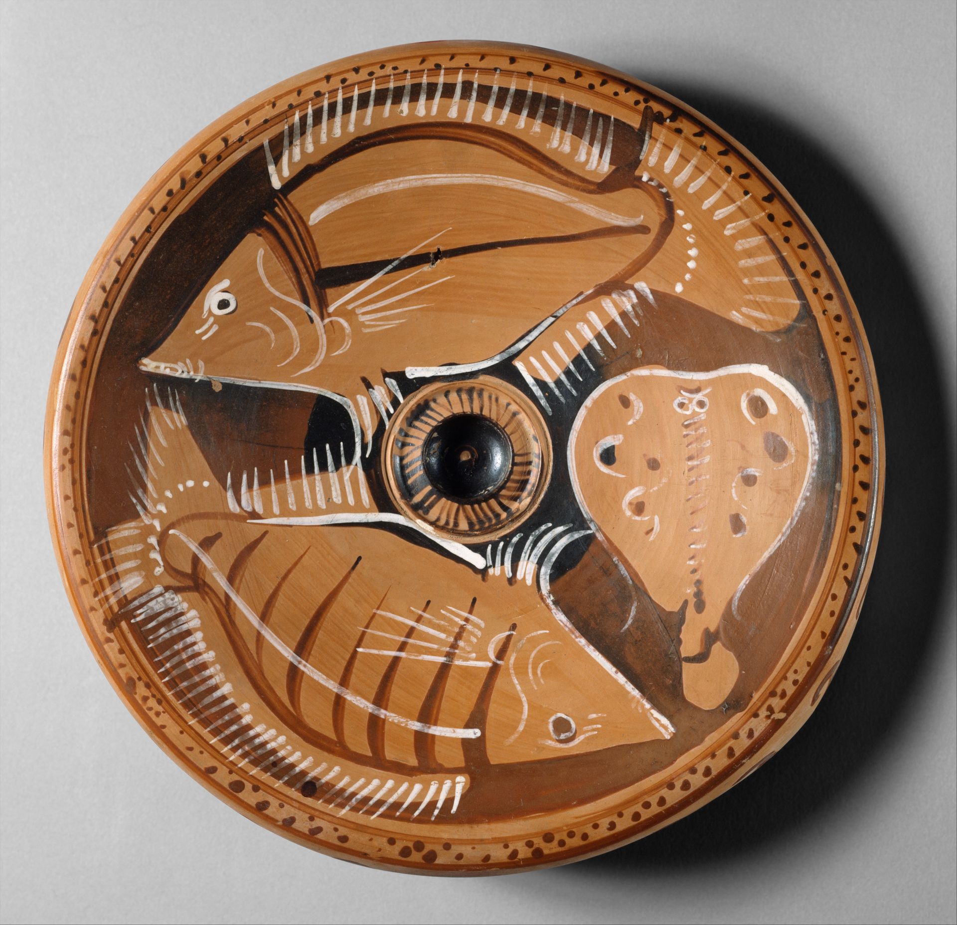 Terracotta fish-plate by Anonymous