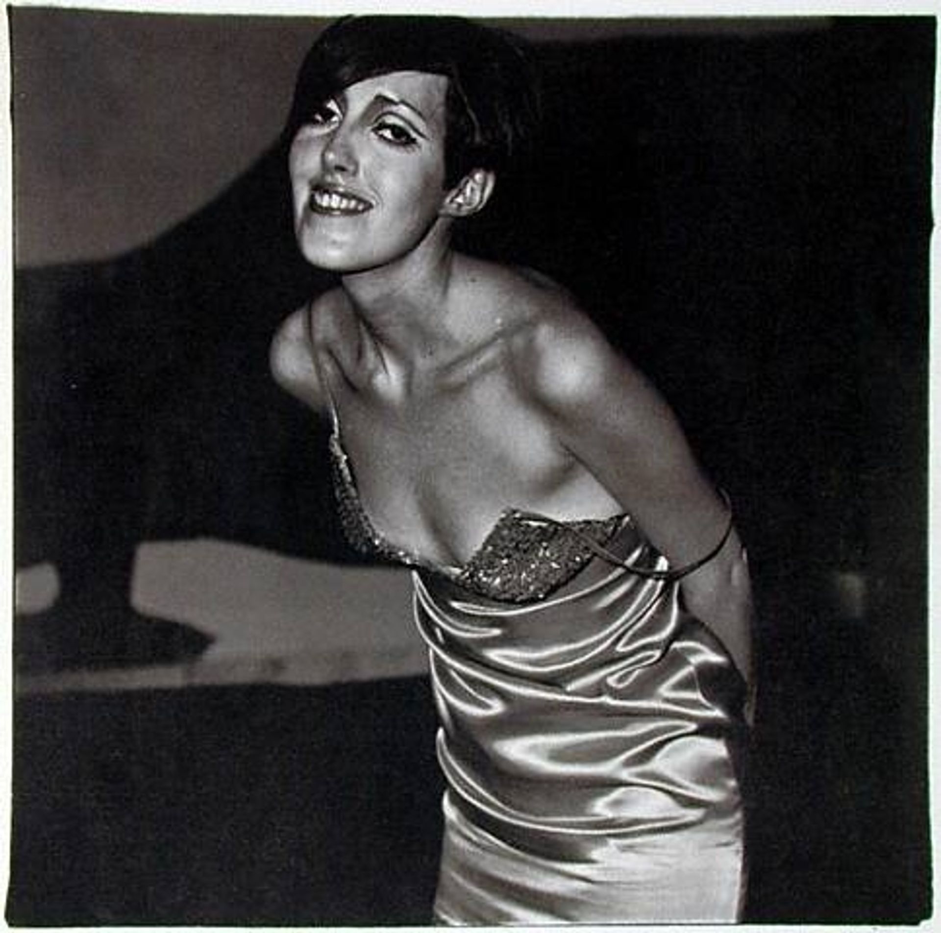Girl in a Shiny Dress by Diane Arbus