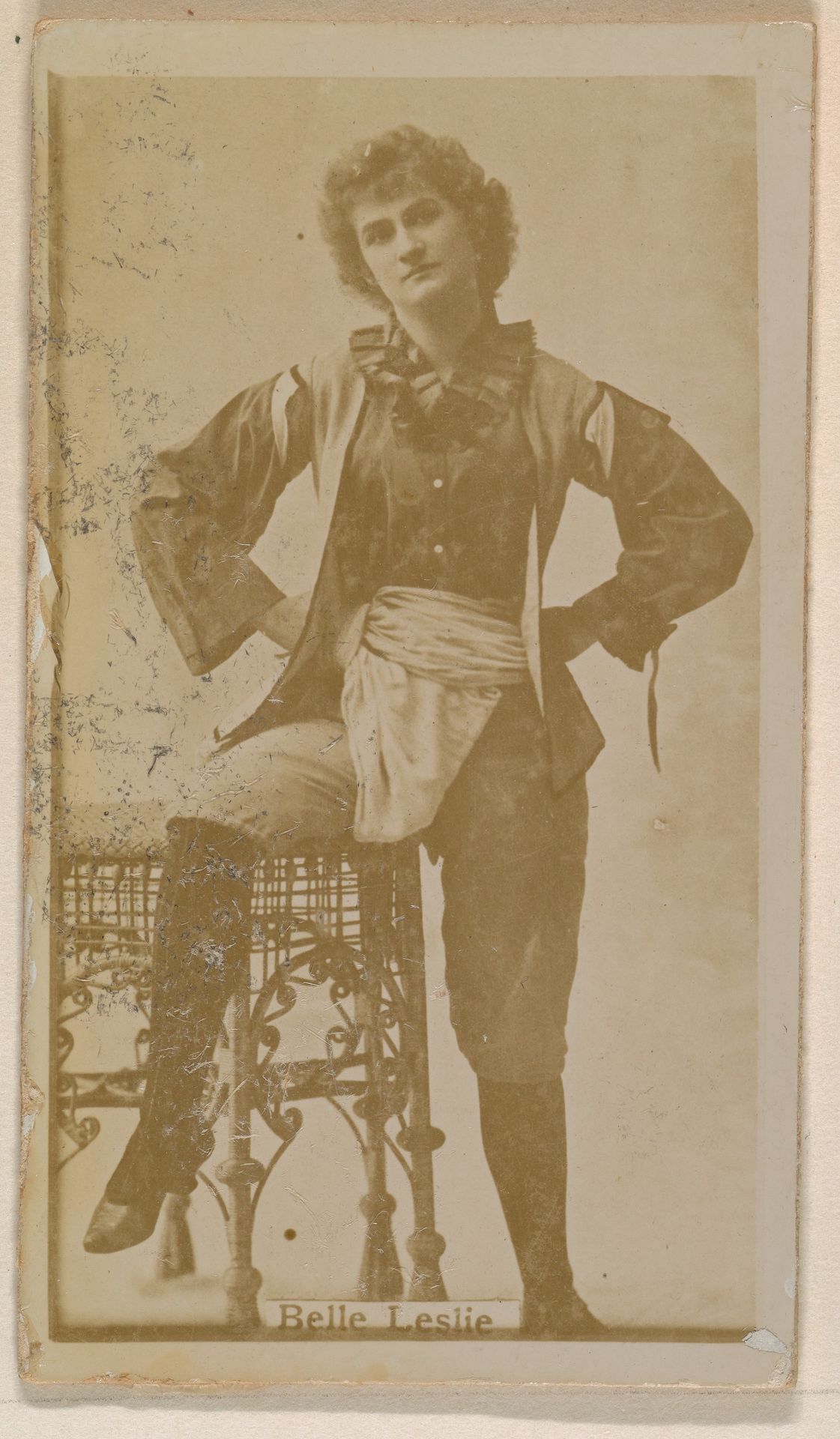 Belle Leslie, from the Actresses series (N245) issued by Kinney Brothers to promote Sweet Caporal Cigarettes by Kinney Brothers Tobacco Company