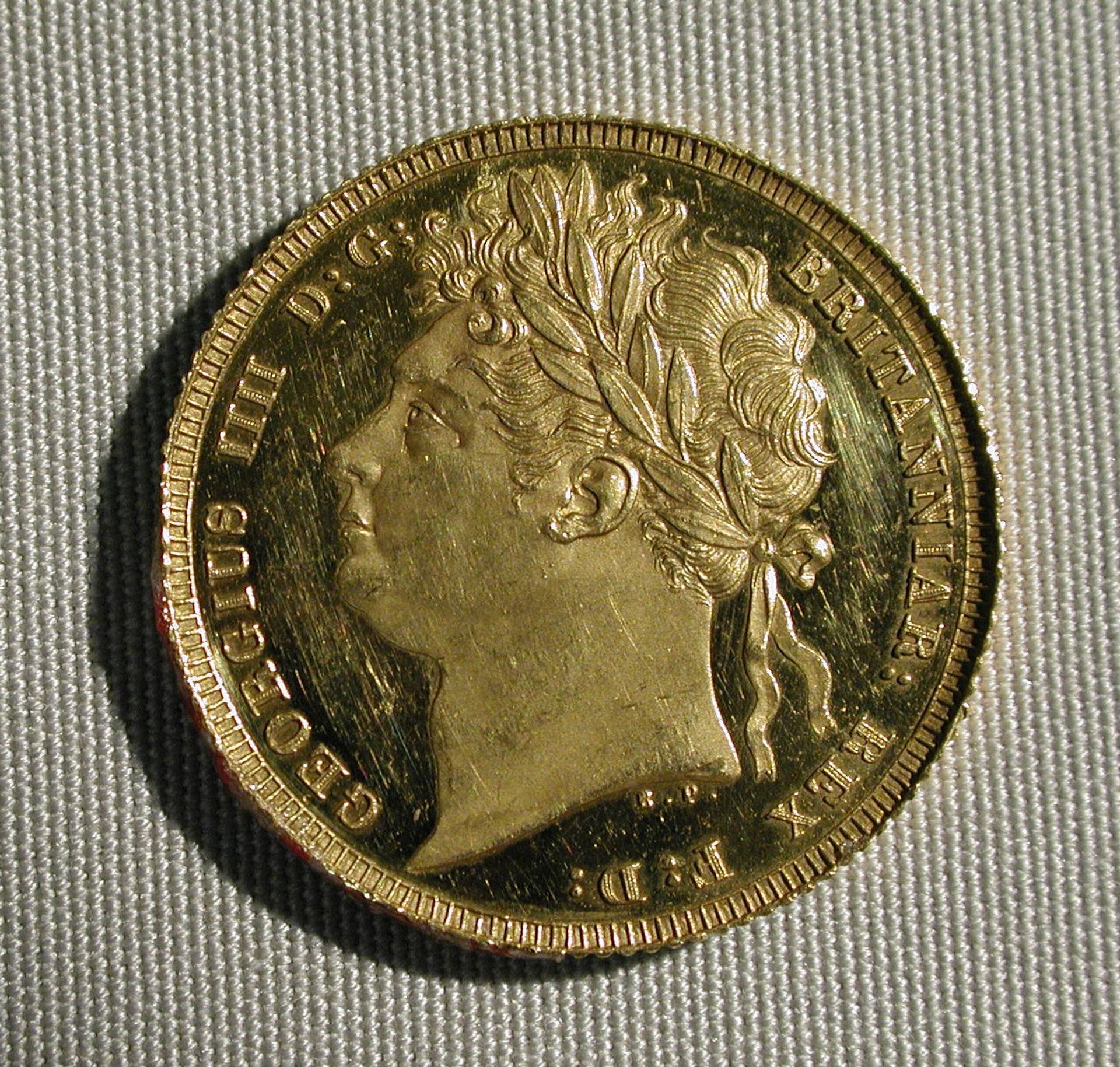 Proof sovereign of George IV (coronation year) by Benedetto Pistrucci