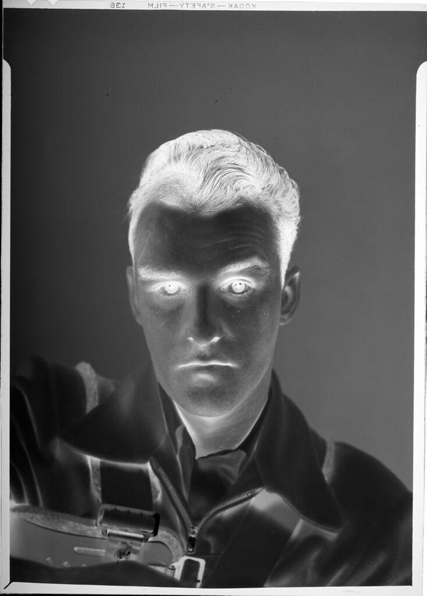 Untitled (face of injured man) by Robert Burian