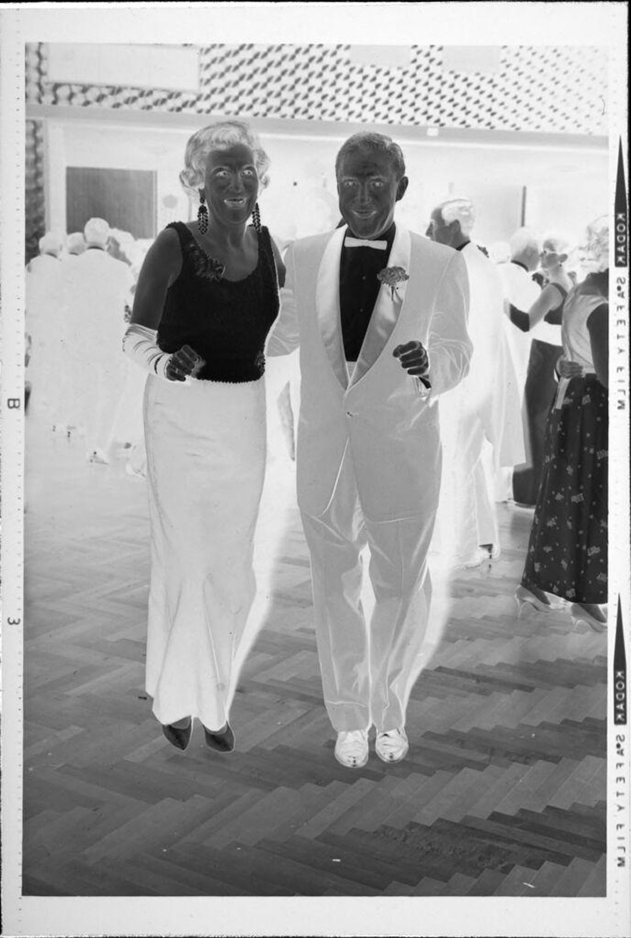 Untitled (man and woman at party) by Robert Burian
