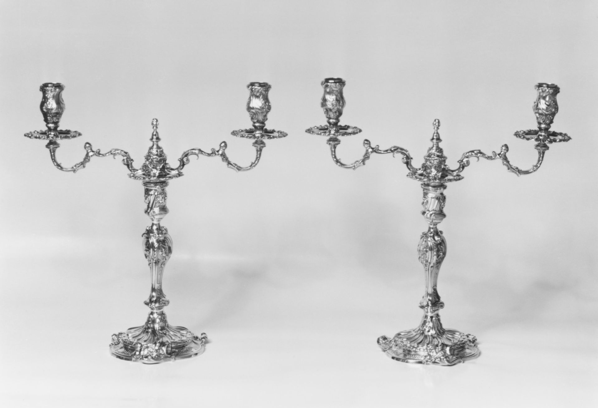 Pair of candlesticks by Paul de Lamerie