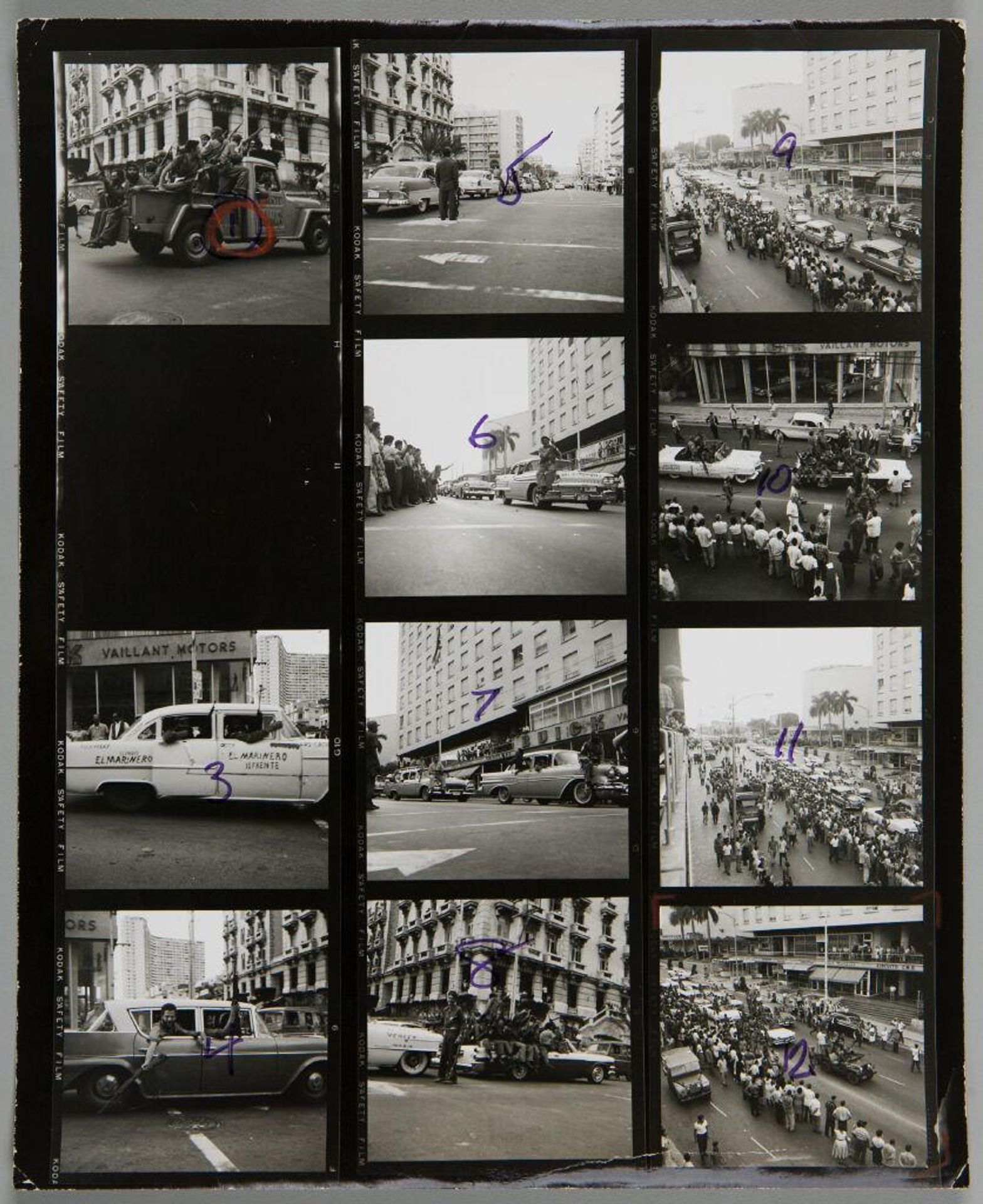 Untitled (eleven photographs: parade and street scenes with Cuban revolutionaries) by Lester Cole