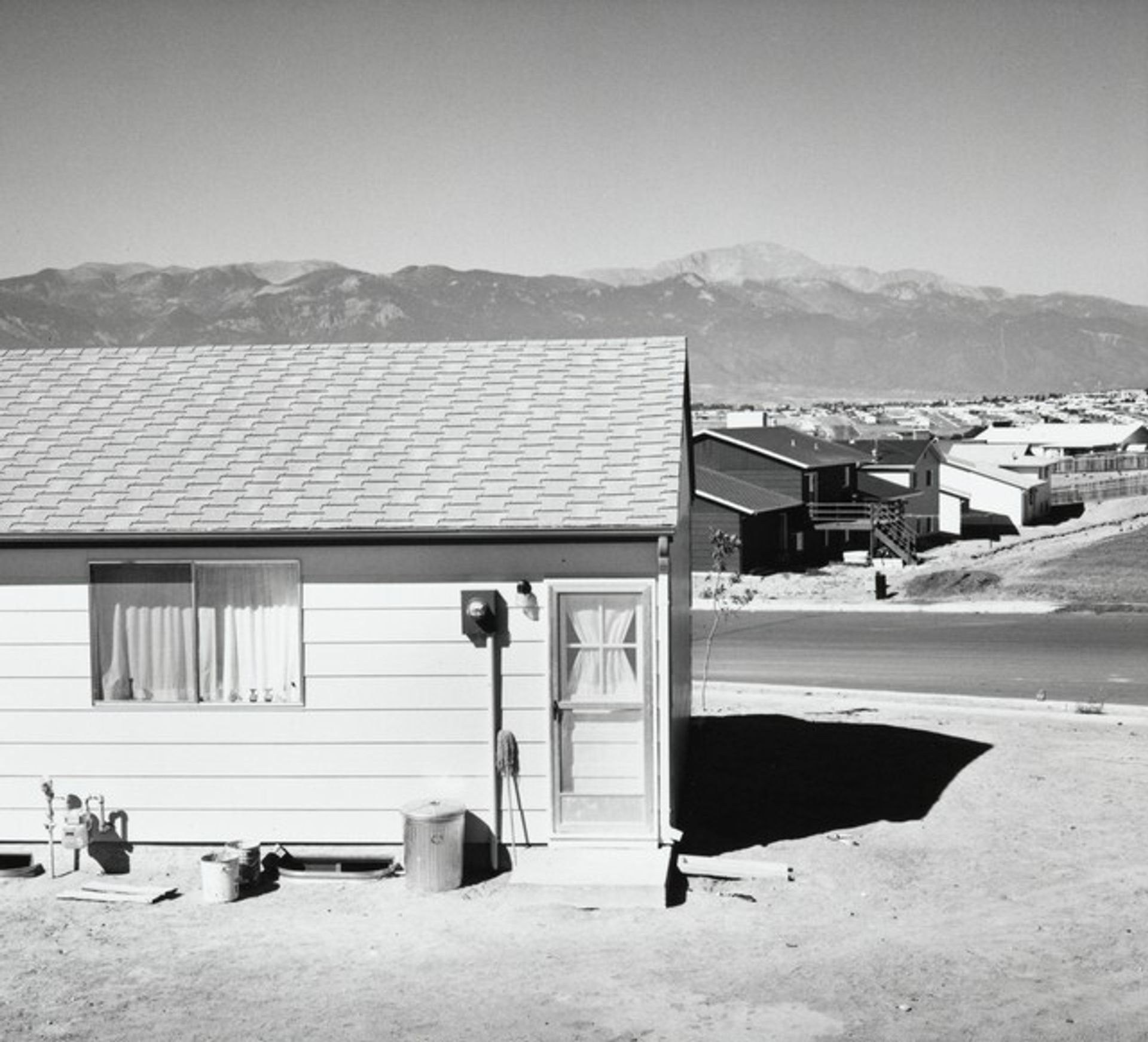 New housing, view of Pikes Peak by Robert Adams
