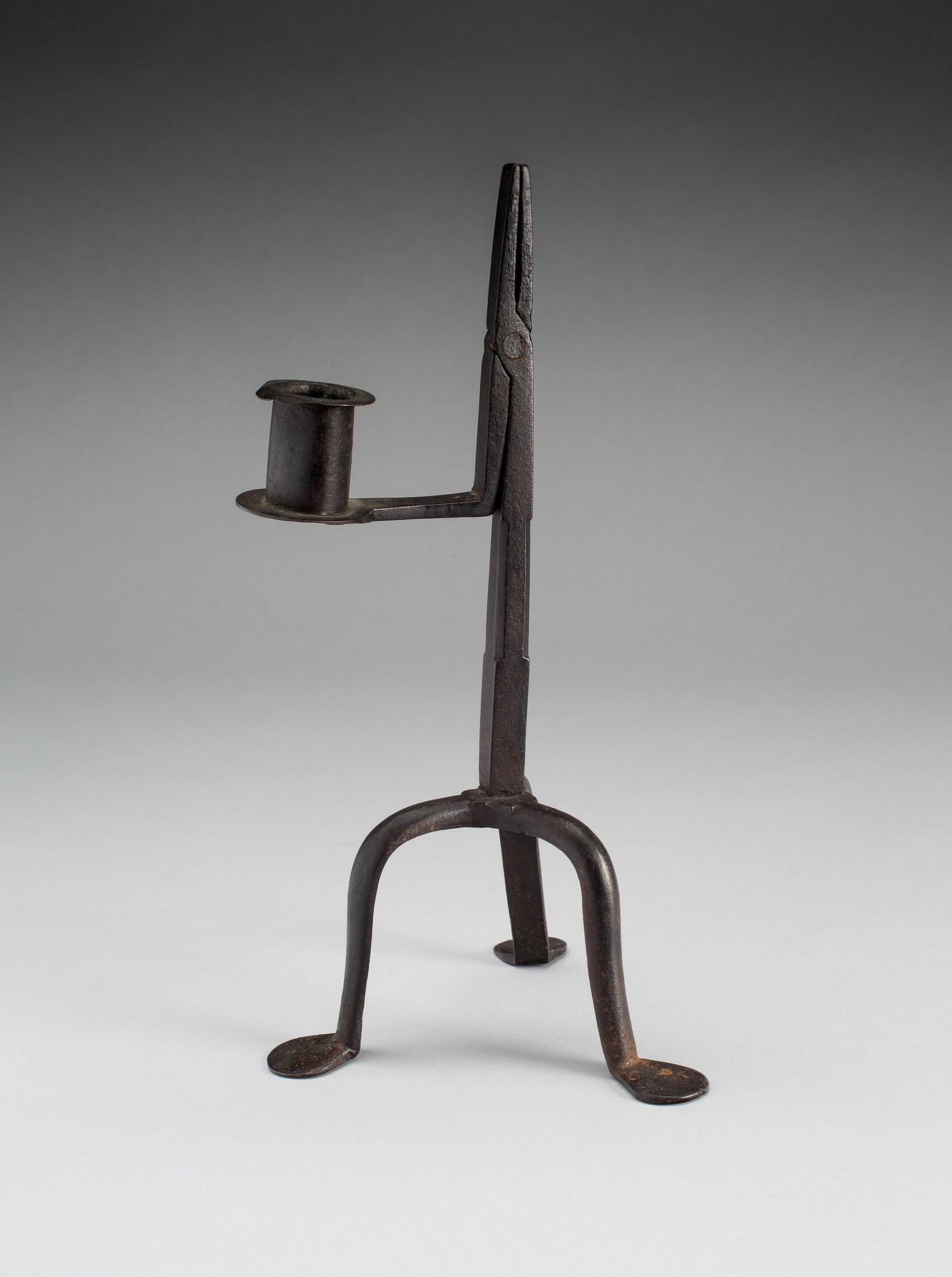 Candlestick and Rushlight Holder by Anonymous