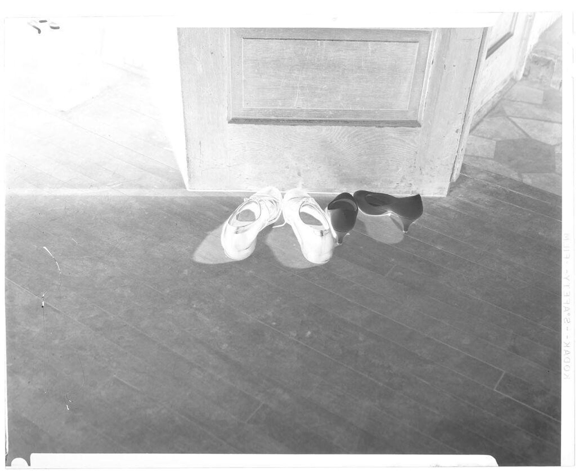 Untitled (shoes taken off at the door) by John Deusing