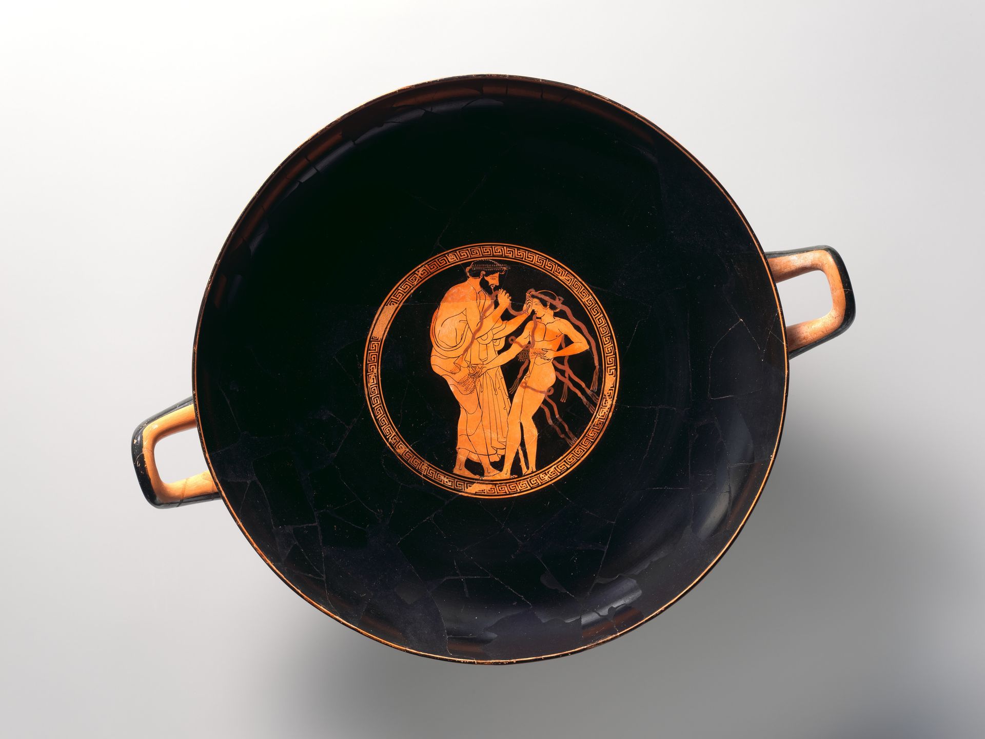 Two fragments of a terracotta kylix, join 1979.11.9; 1980.304; 1988.11.5; 1989.43; 1990.170; 1995.540 by Hieron