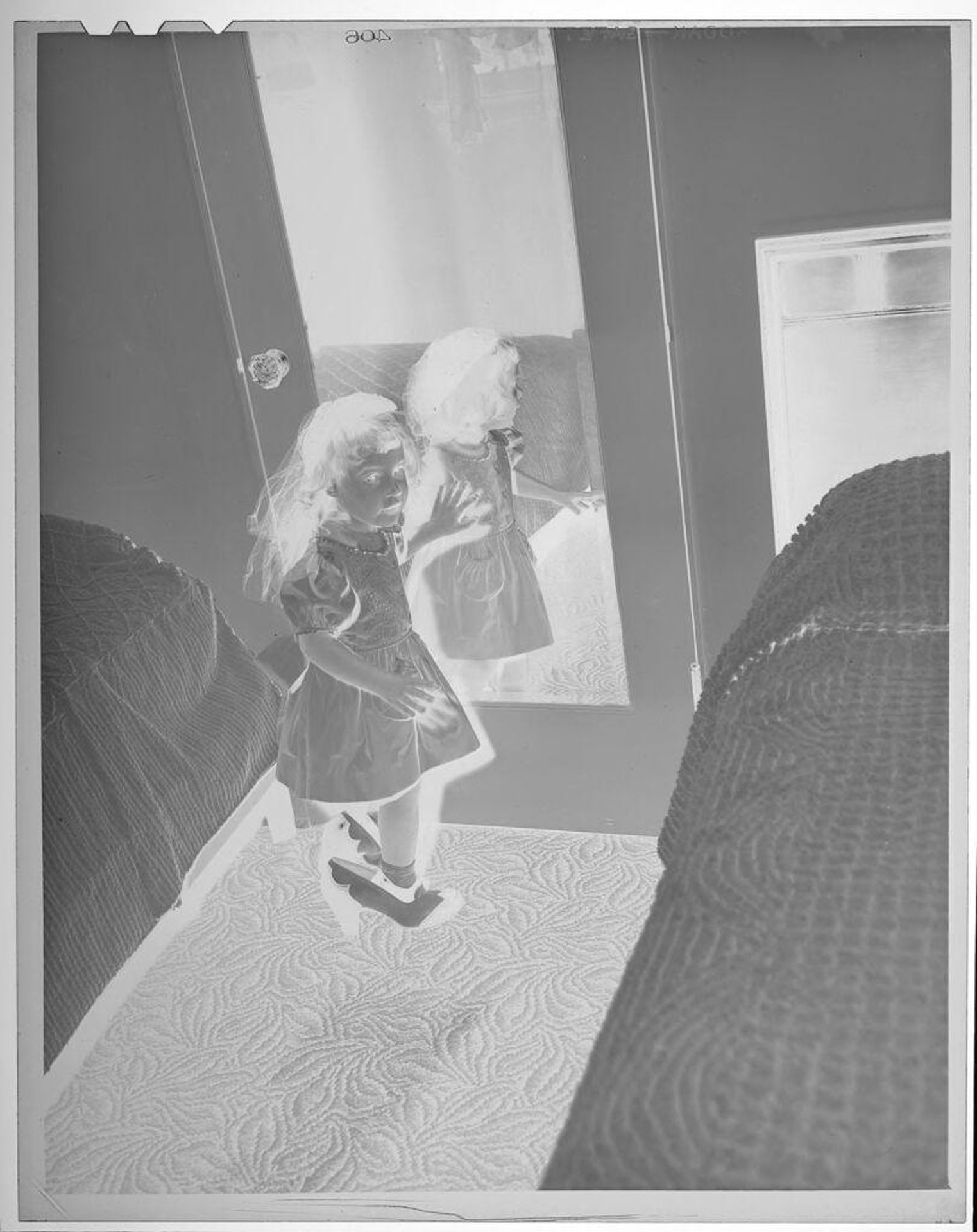 Untitled (girl looking in mirror) by Lucian and Mary Brown