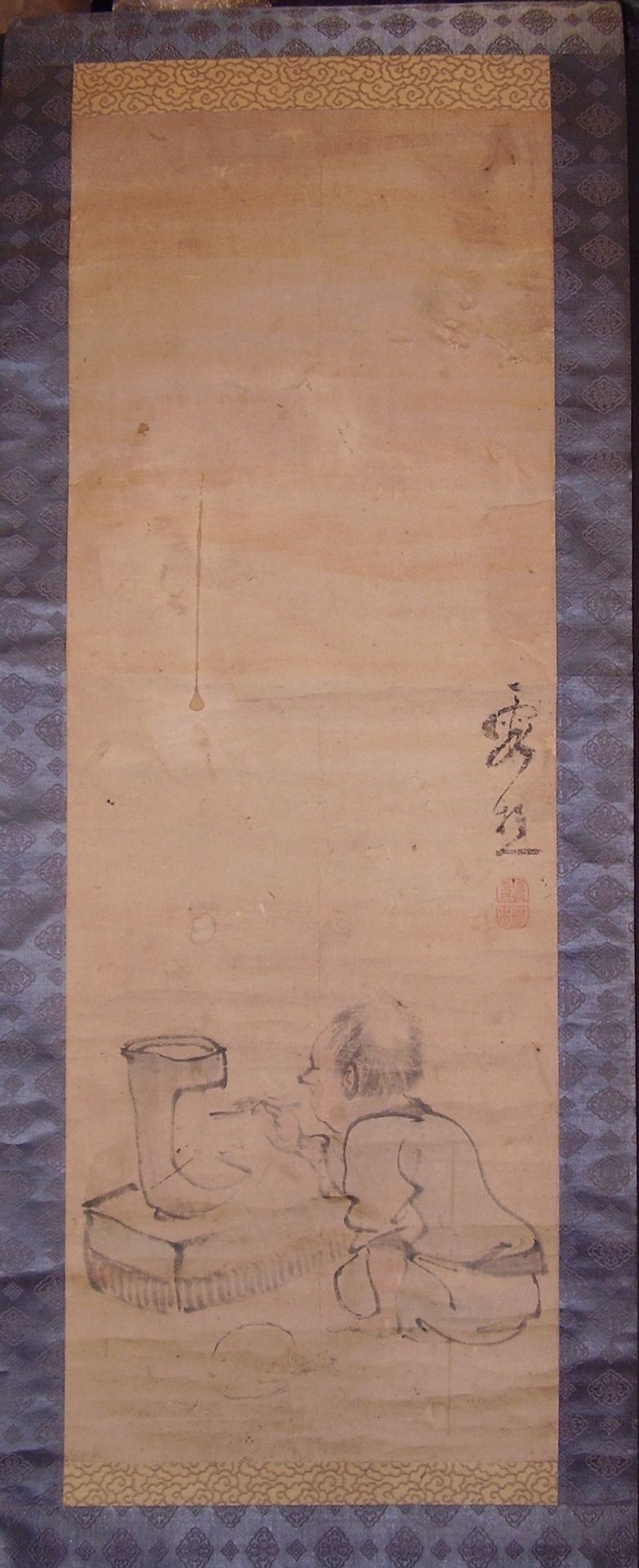 Lighting a charcoal brazier (possibly in preparation for a tea ceremony?) by Ike no Taiga